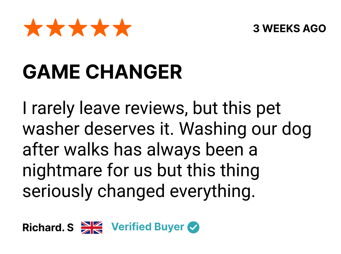 Customer review with five orange stars, published three weeks ago, titled 'Game Changer'. The reviewer, Richard S., gives a positive comment about a pet washer that changed everything for them, especially after walks with their dog. The review includes a British flag icon and a 'Verified Buyer' badge.