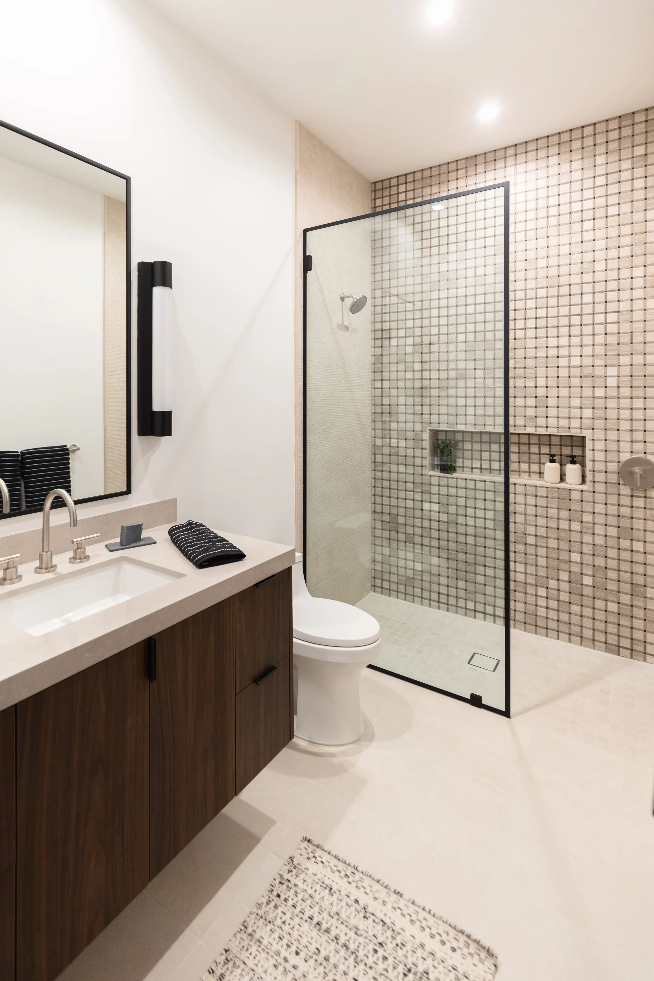 ome-at-last-primary-bathroom-vanity-shower-ashley-marie-interiors.jpg