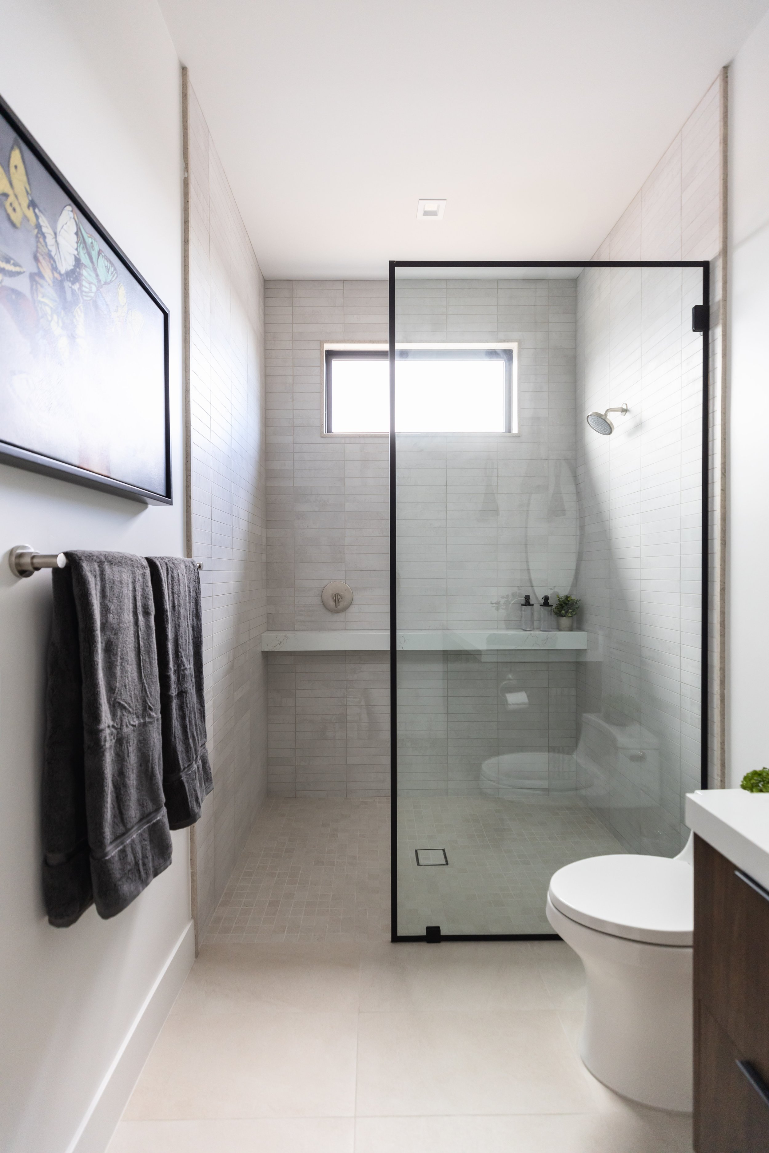 home-at-last-glass-walk-in-shower-ashley-marie-interiors.jpg