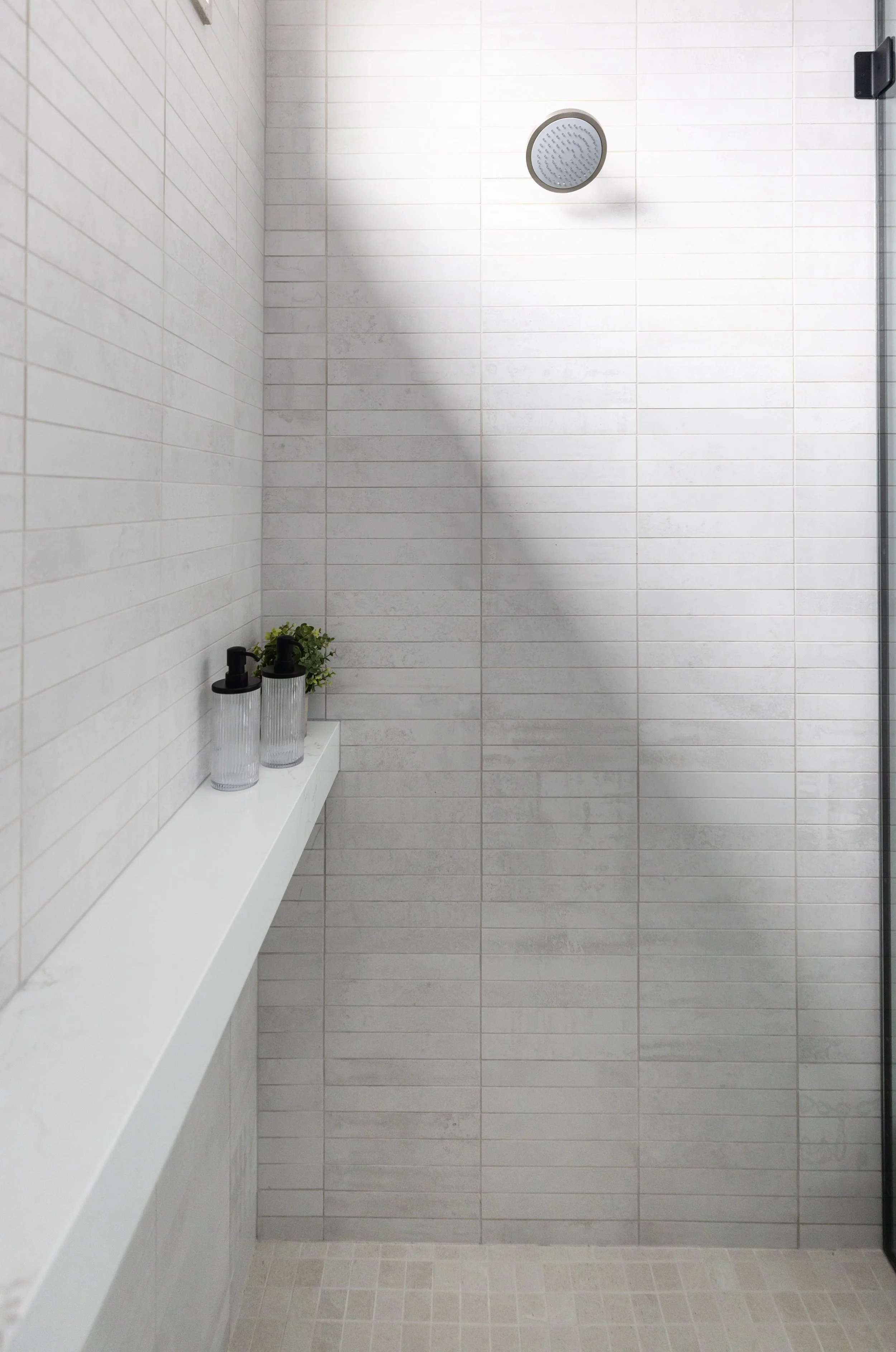 home-at-last-modern-walk-in-shower-ashley-marie-interiors.jpg