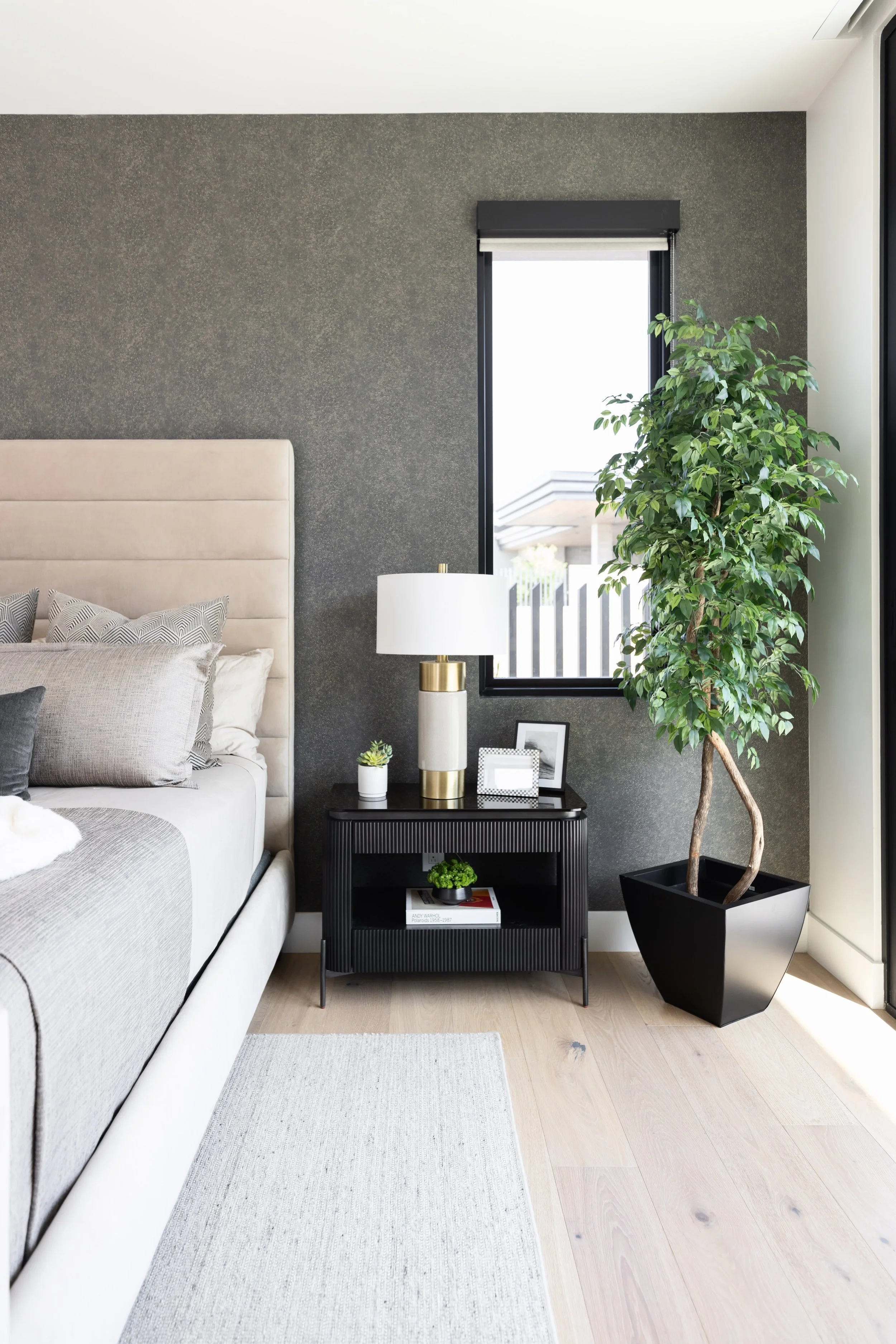 home-at-last-primary-bedroom-side-view-ashley-marie-interiors.jpg