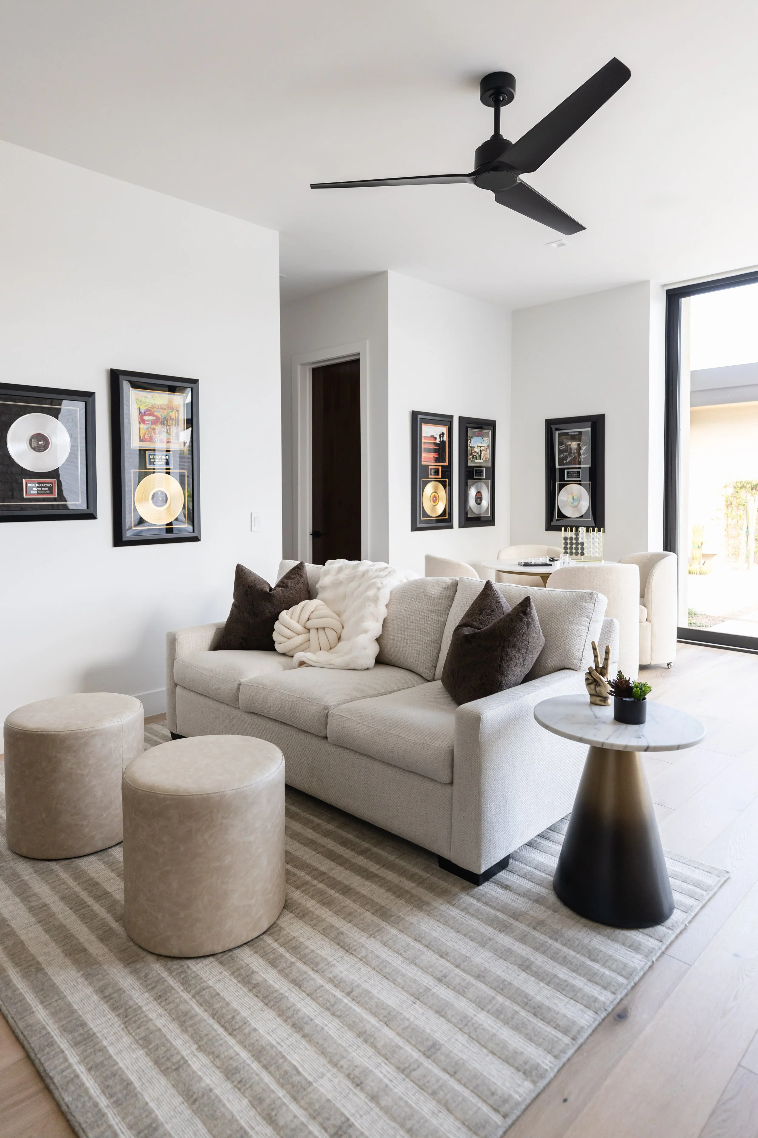 Custom home furniture and space planning in a Scottsdale living room by Ashley Marie Interiors. Under