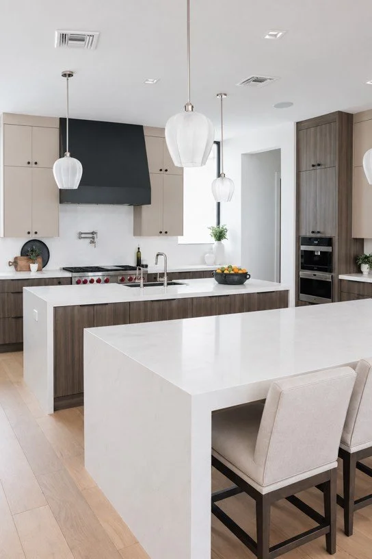 Custom kitchen cabinetry and double island design in a Scottsdale home by Ashley Marie Interiors.
