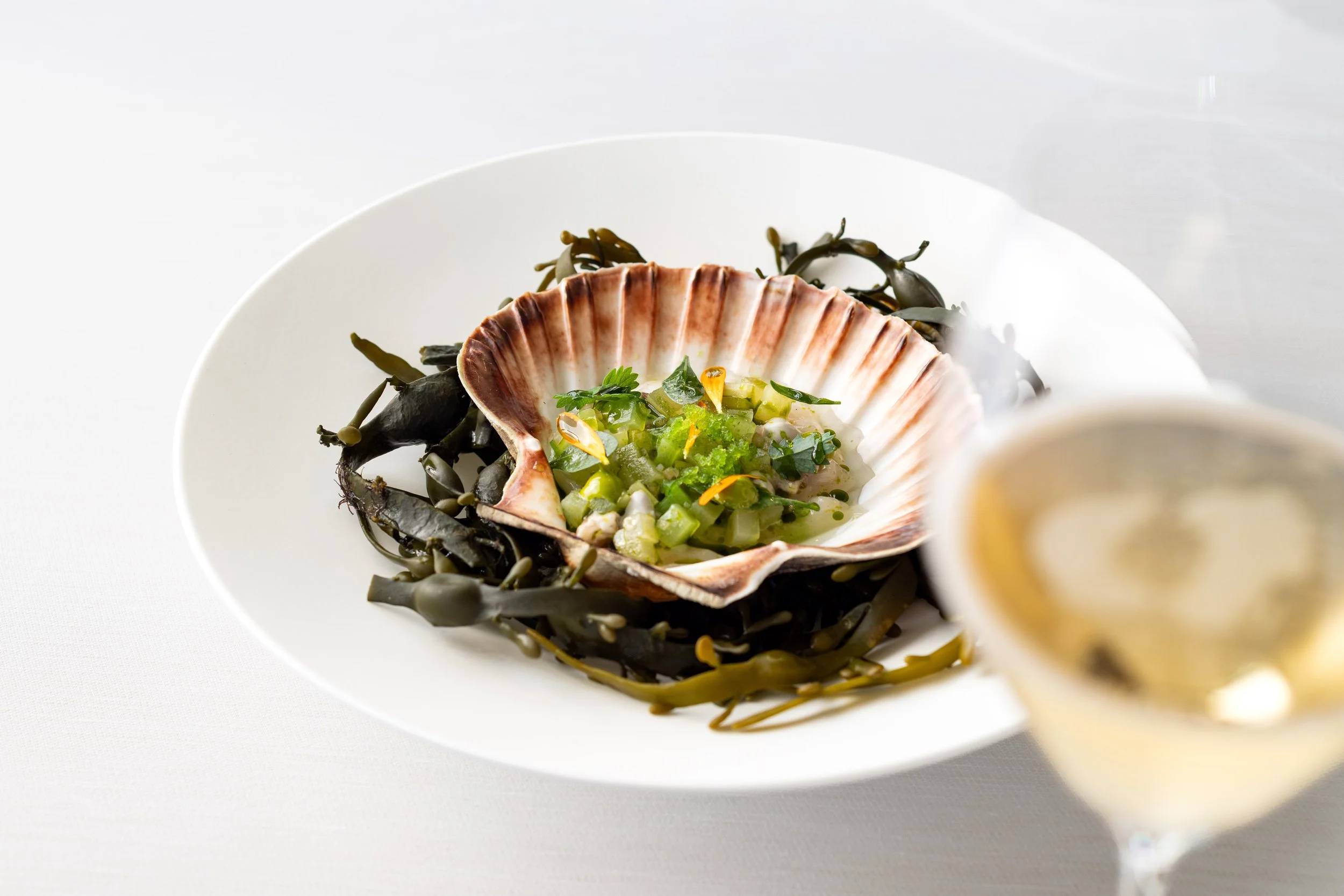 Scallop dish served with 1086 by Nyetimber sparkling wine at The Woodcote Wine Dinner.