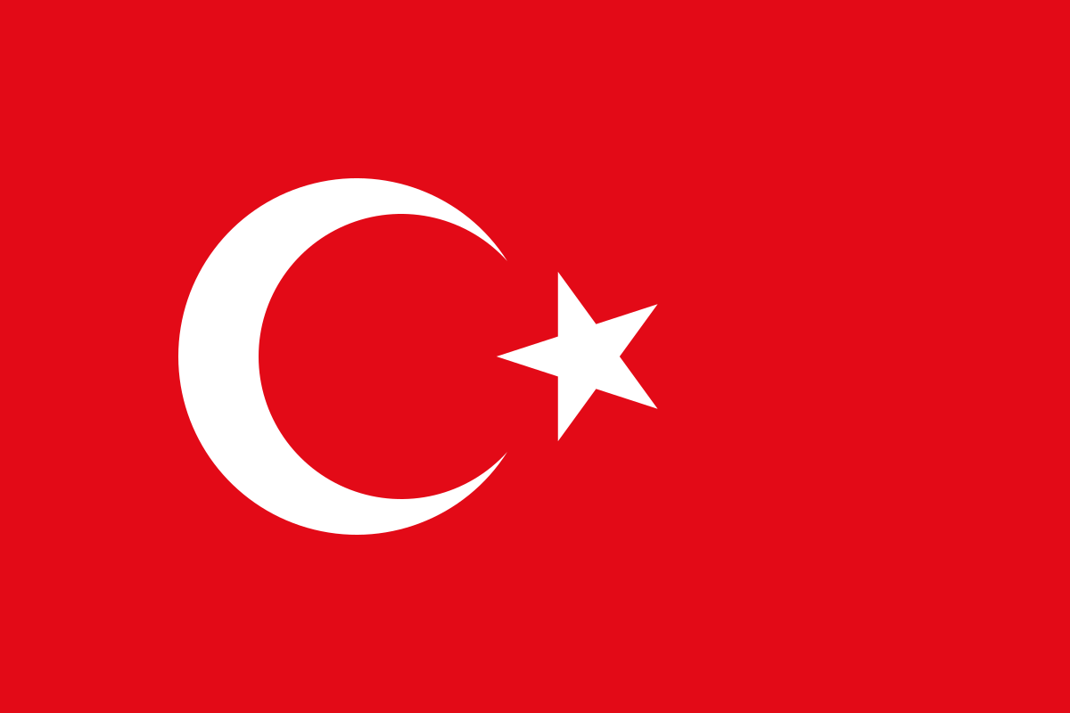 The Turkish flag featuring a red background, white crescent moon, and star.
