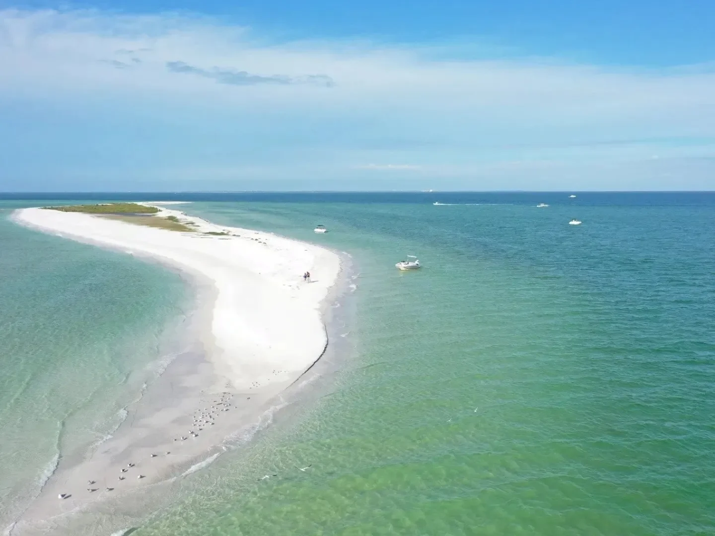 things to do in Anna Maria – Passage Key – aerial view of sandbar at Passage Key surrounded by turquoise water.