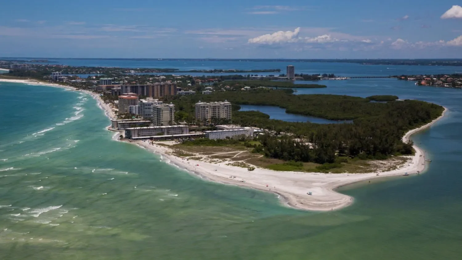 things to do in Sarasota – Lido Key – Aerial view of Lido Key Island with powder-white beaches and calm Gulf waters.