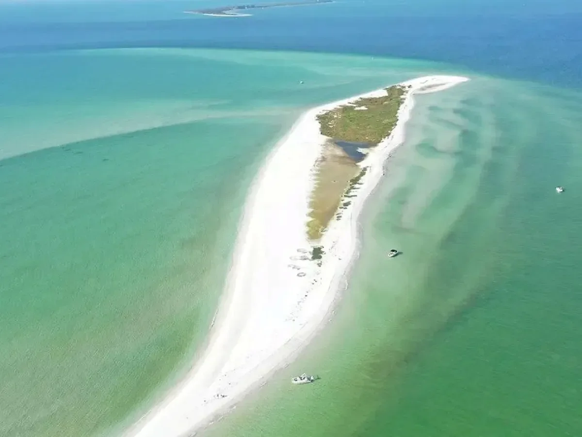 things to do in Anna Maria – Passage Key – aerial view of sandbar at Passage Key surrounded by turquoise water.
