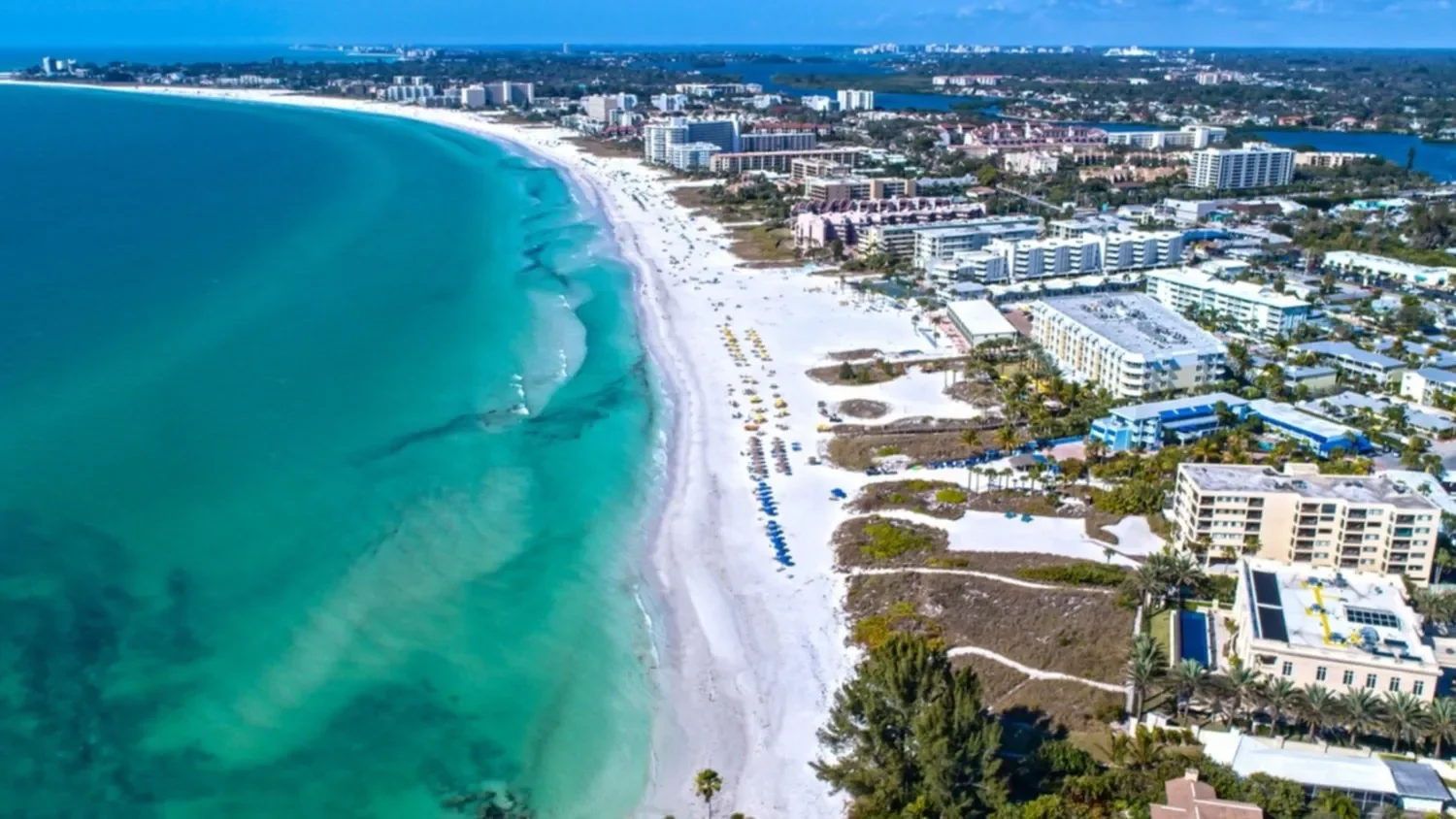 things to do in Sarasota – Siesta Key – Birds-eye view of Siesta Key’s pristine turquoise shoreline.