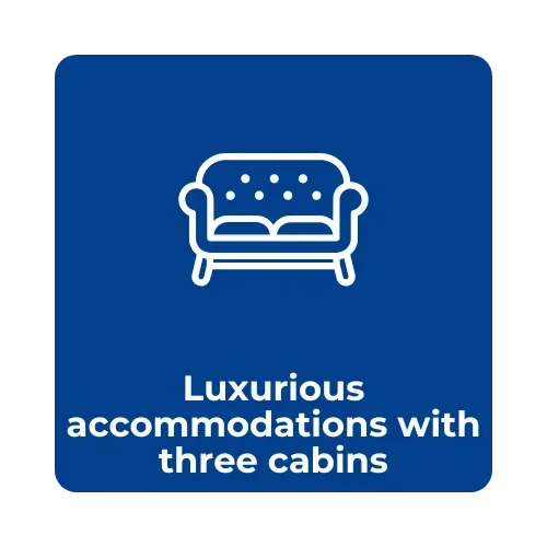 Icon of a sofa with text that reads 'Luxurious accommodations with three cabins'.