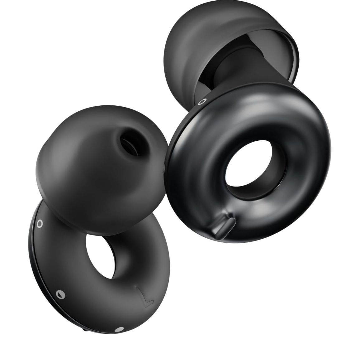 Wireless black earbuds with ear tips and charging case isolated on white background