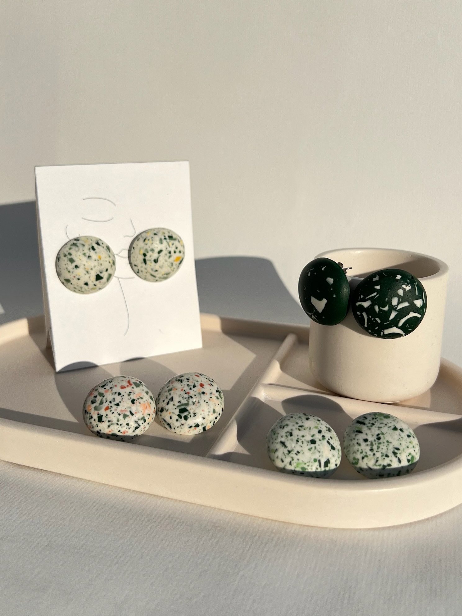 white earings with blue - green and coral terrazo.jpg