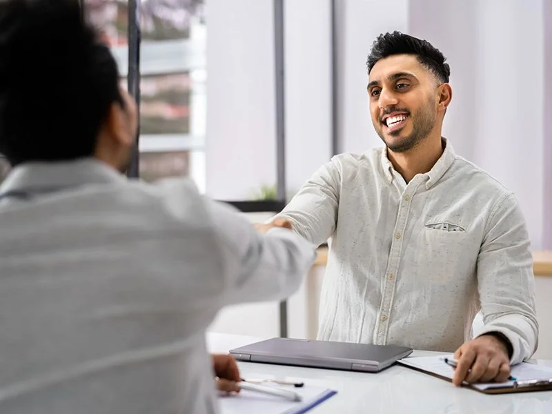 Man applying for a job in Redding, CA after filling out job applications in the U.S.