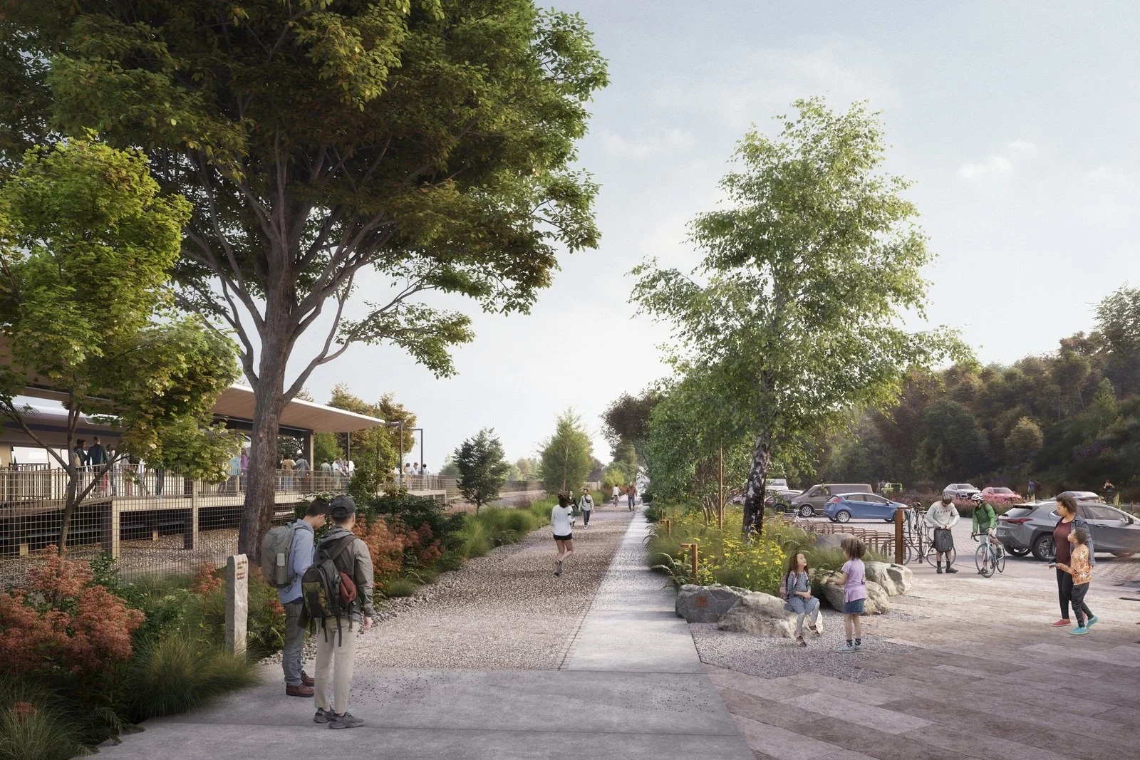 Concept rendering of planned improvements at Breakneck Ridge train station: Pedestrian path lined with trees and plants, people walking and cycling, parked cars, sunny day.
