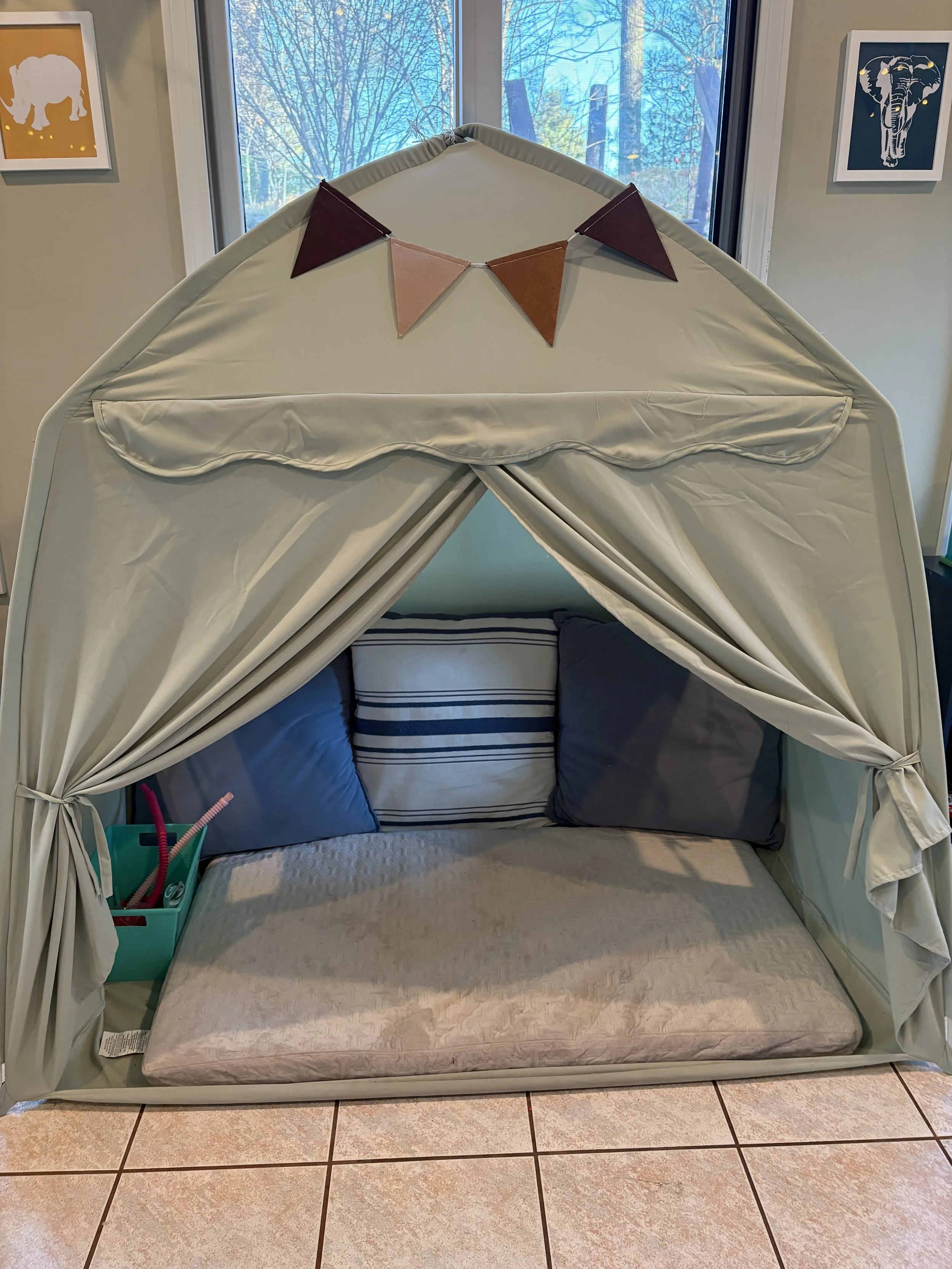 Calming Corner: We provide a comfortable space with several sensory options.