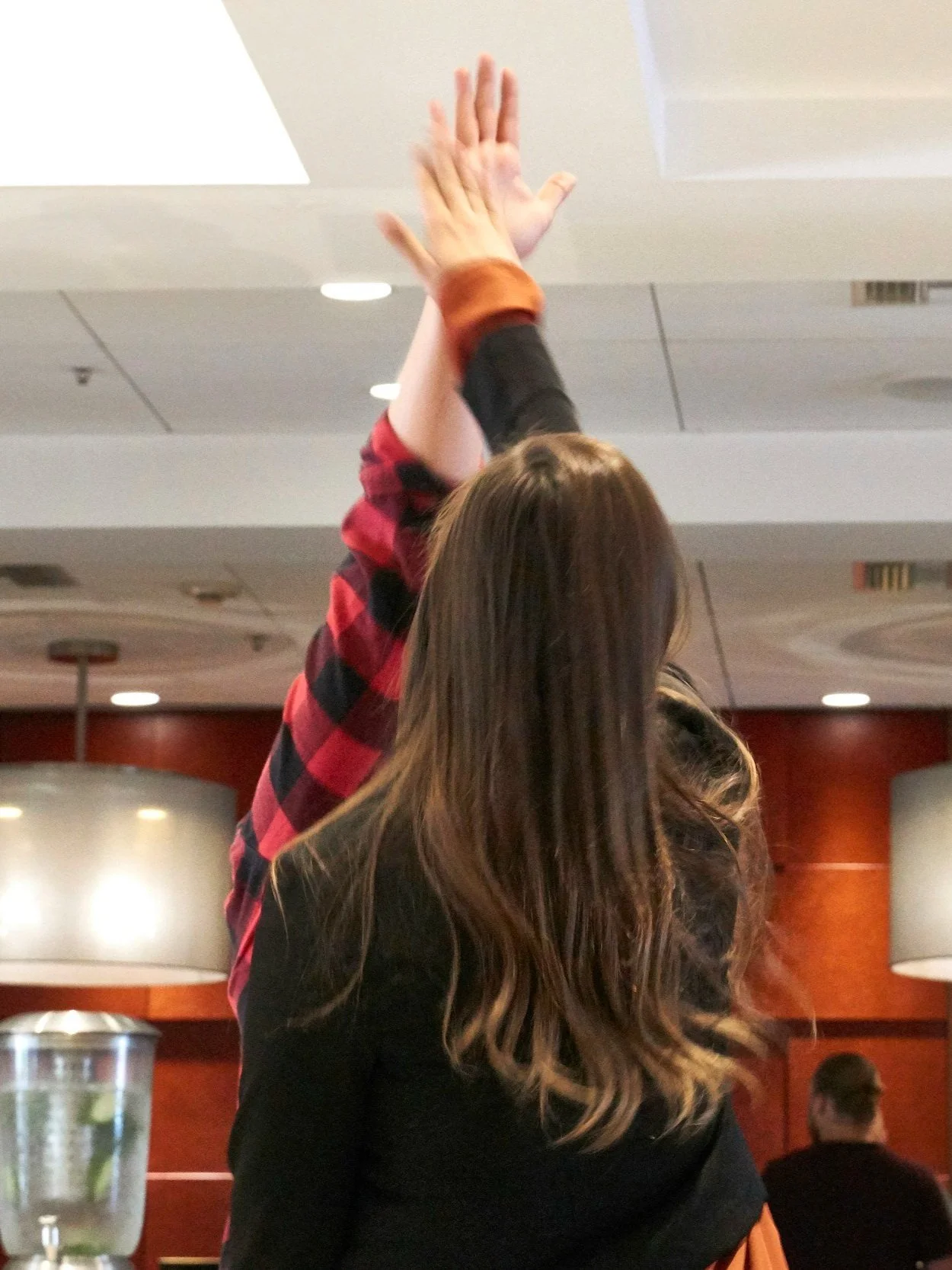 Coworkers giving a high five