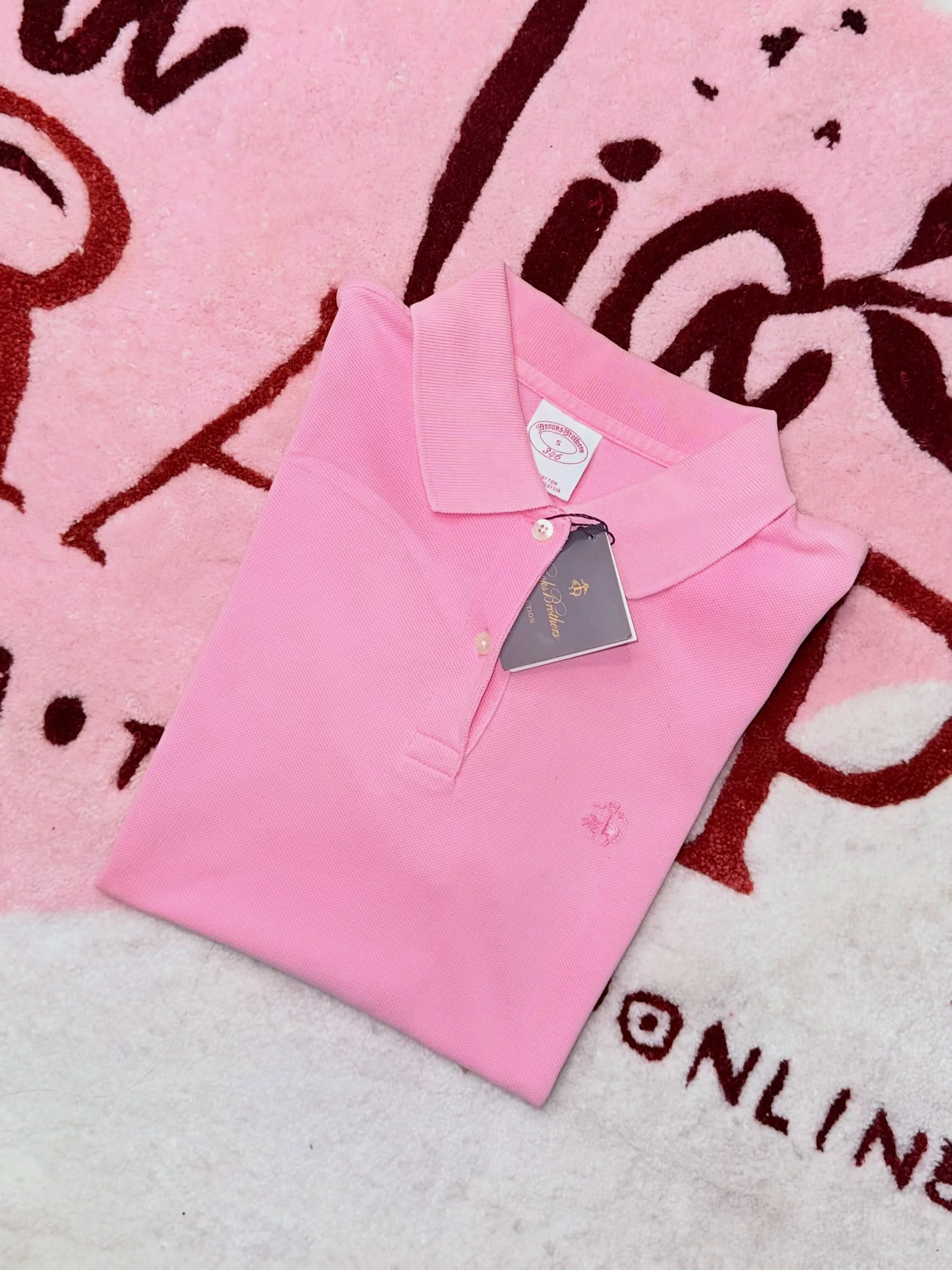 Dama playera Brooks talla S $650 PROMO