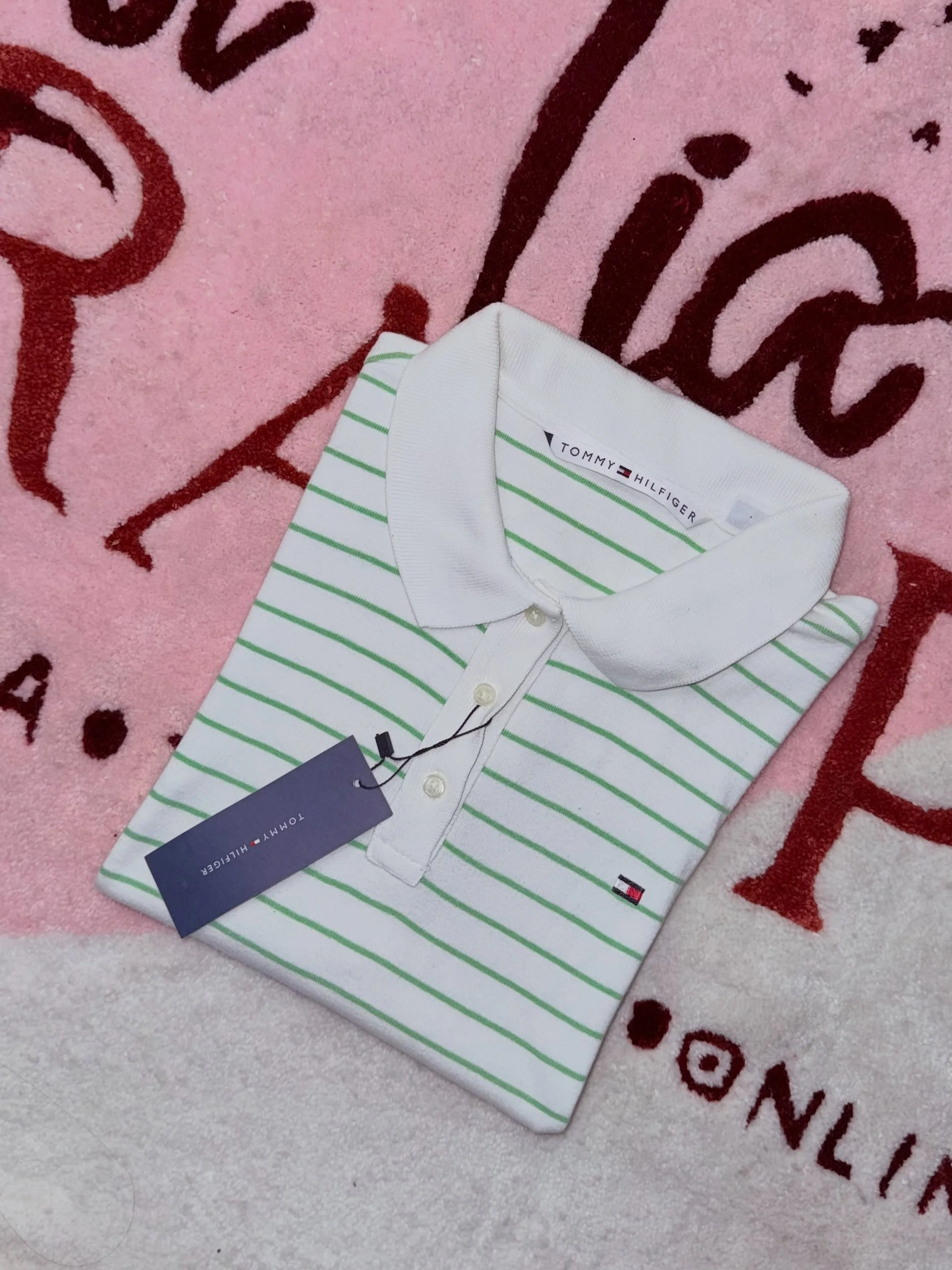 Dama playera T OMMY talla M y L $399$ PROMO