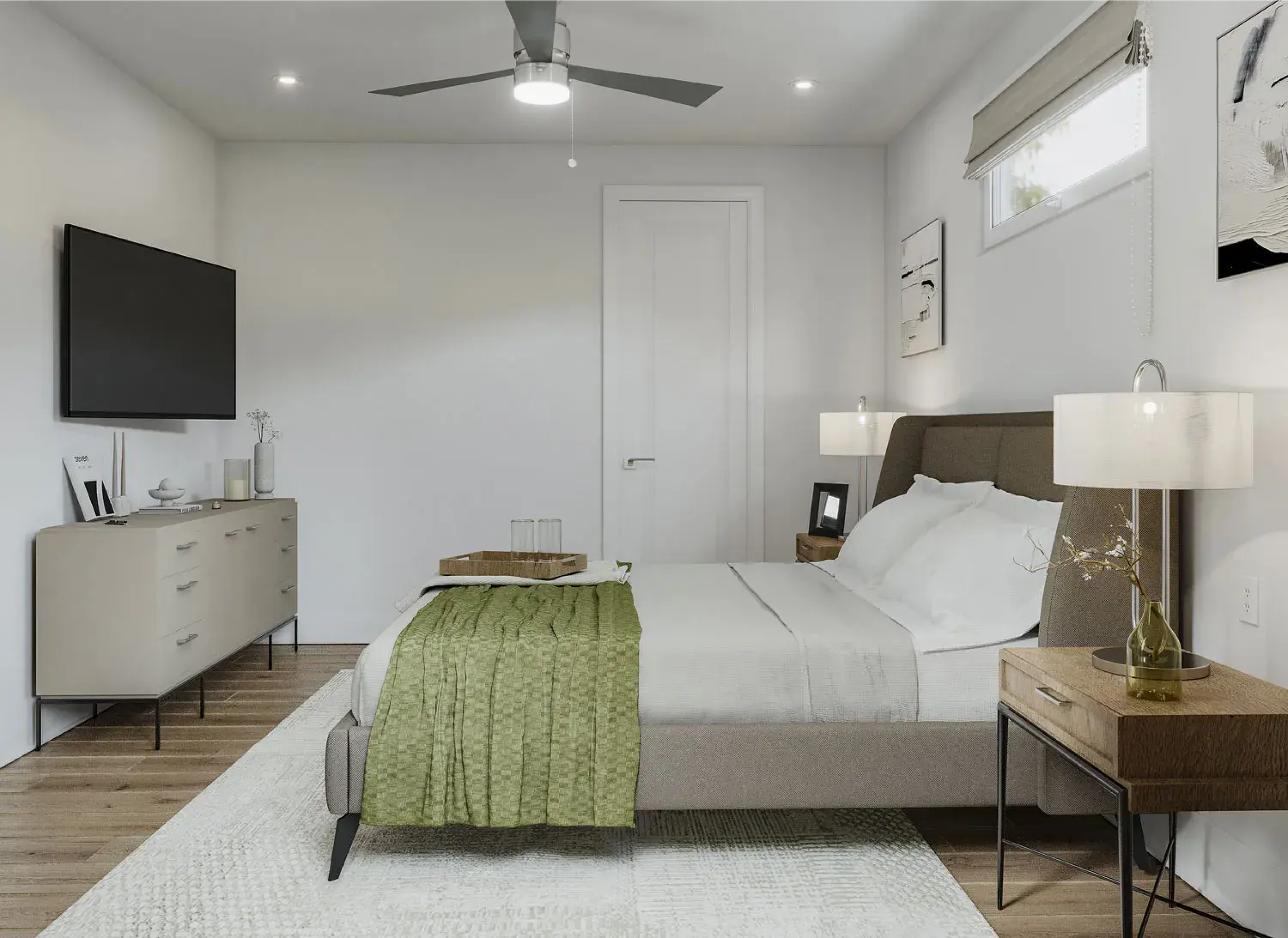 Minimalist bedroom with upholstered bed, modern ceiling fan, large windows, neutral decor, and nightstands with table lamps; serene, light-filled space with clean lines and natural tones.