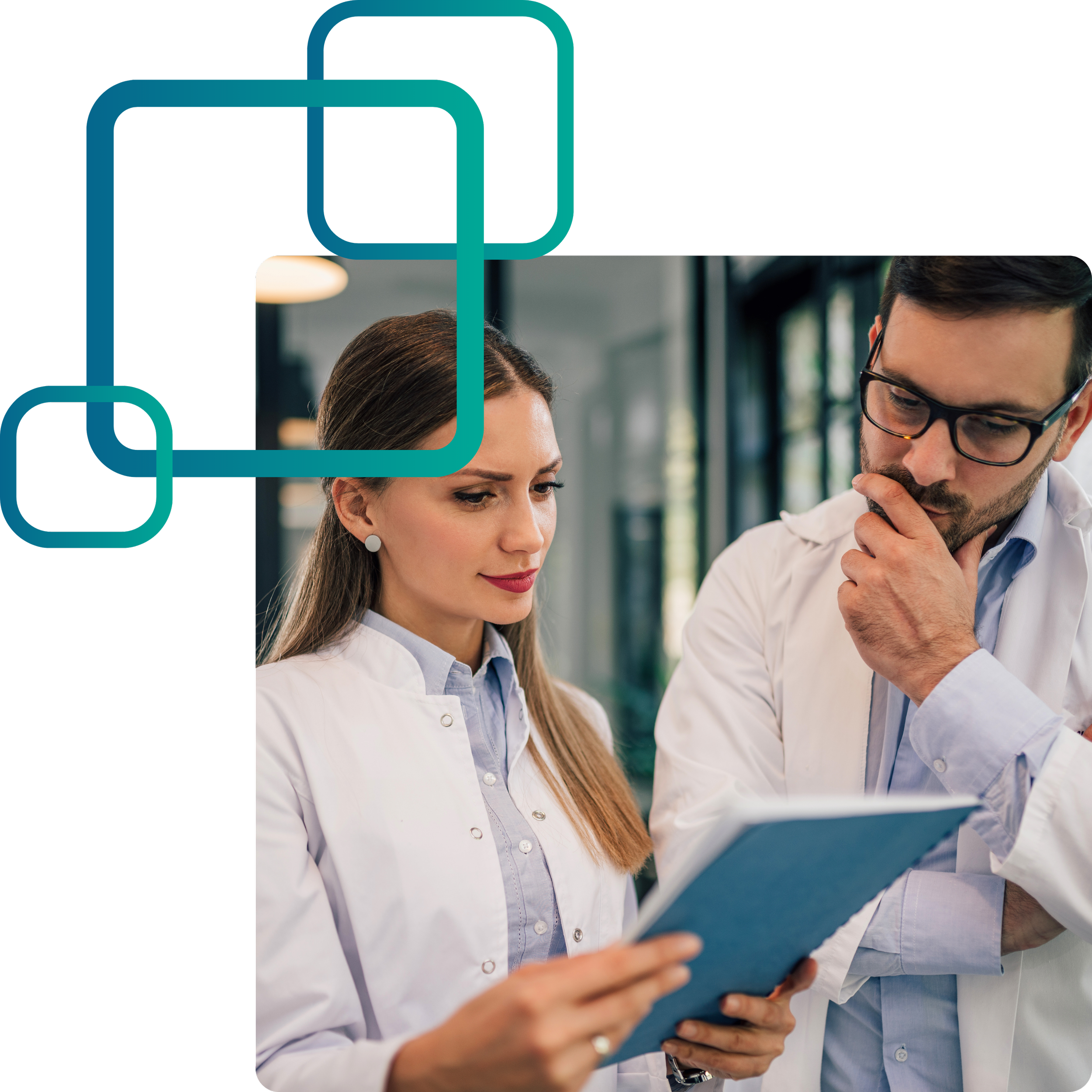 Two medical professionals, a woman with long brown hair and pearl earrings, and a man with dark hair and glasses, are looking at a tablet together, possibly discussing medical information.