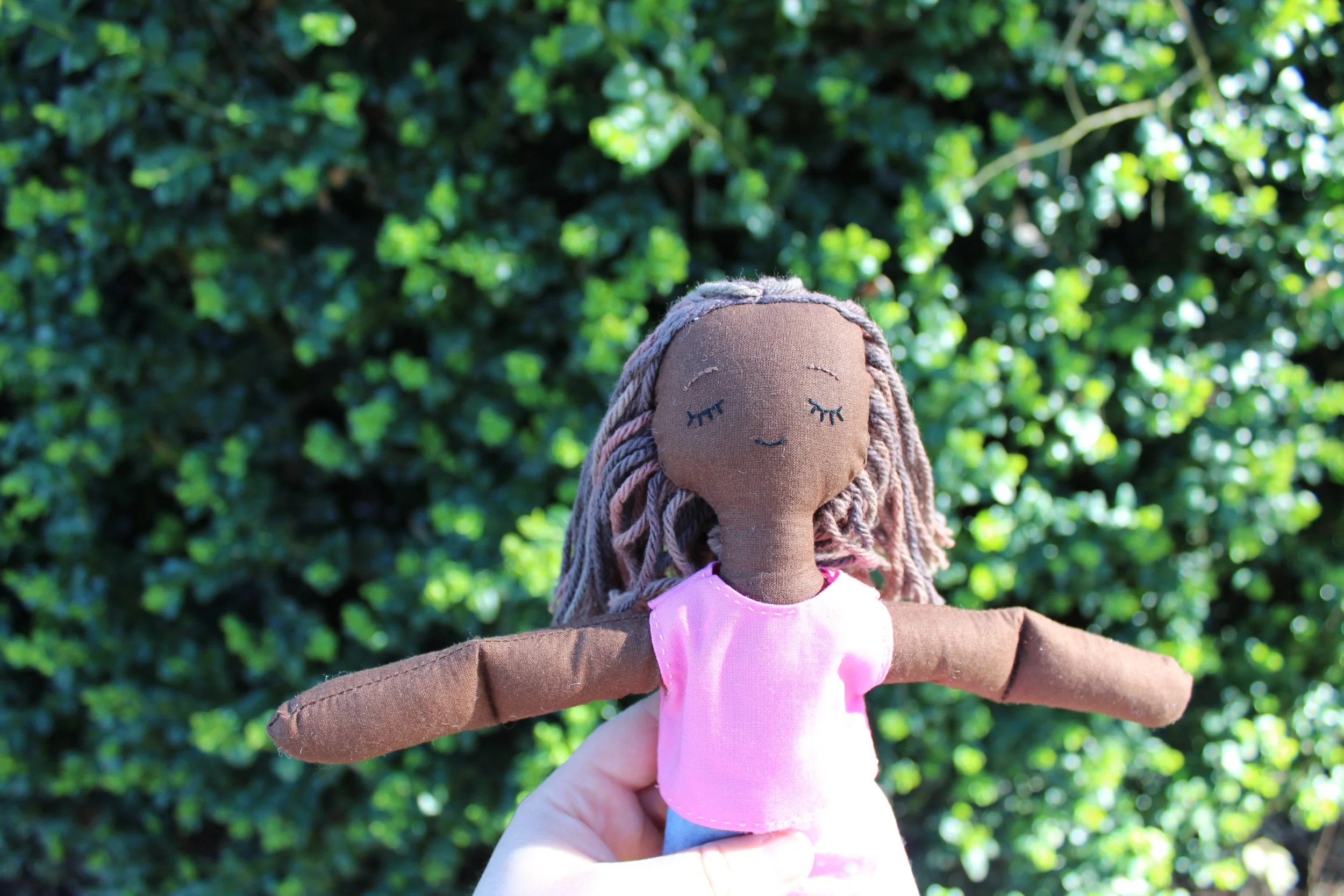 Doll with Pink Shirt and Pants