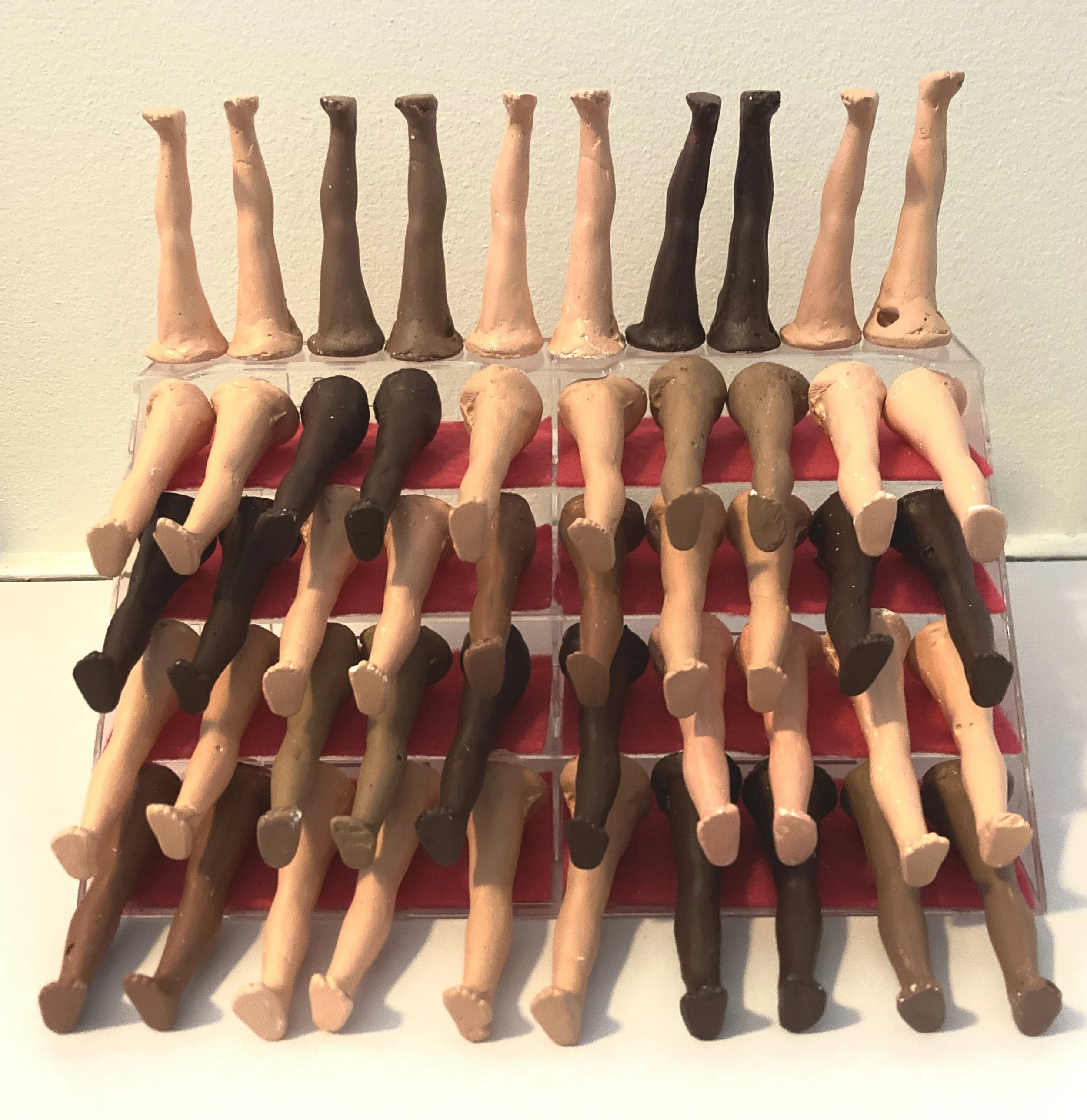Doll Legs
2022
Plaster, plastic organizer