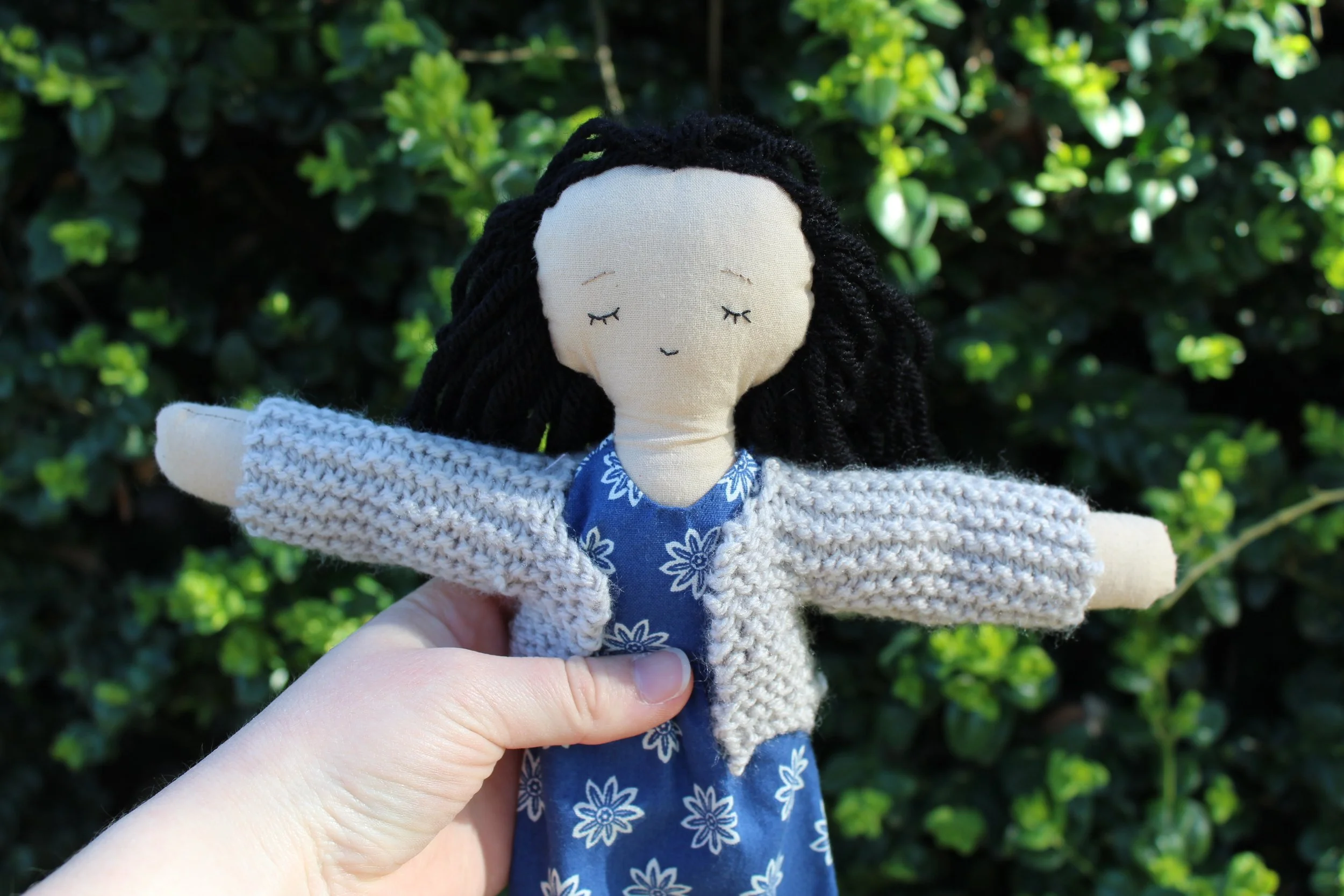 Doll with Blue Dress and grey sweater