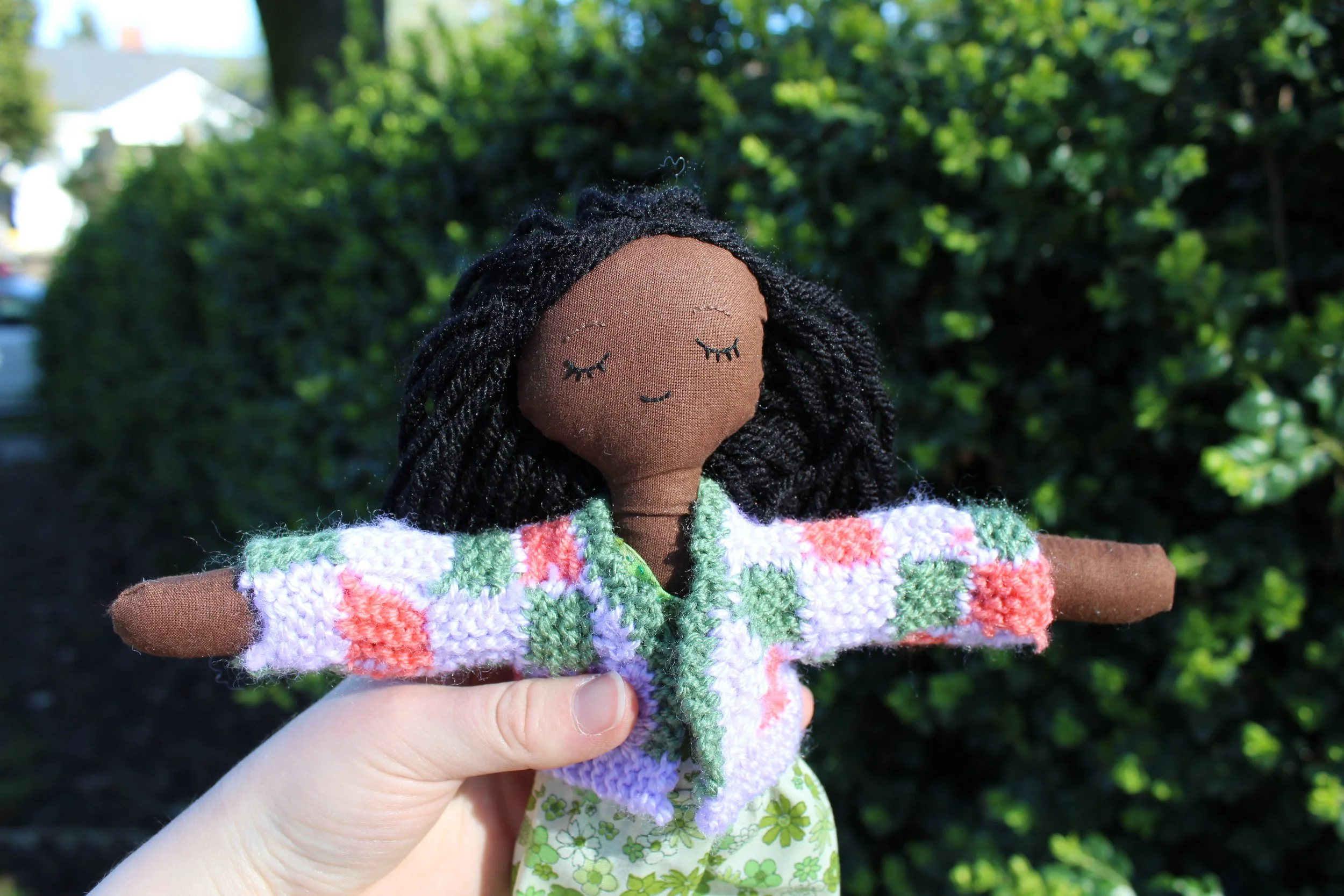 Doll with Green Dress and Fun Sweater