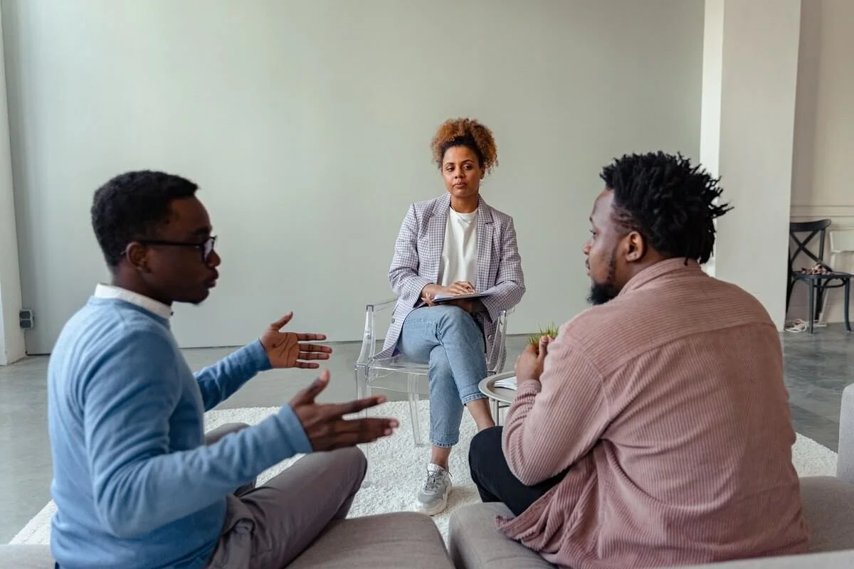 Couple meeting with an Illinois therapist who specializes in rebuilding trust, improving communication, and strengthening emotional connection after relational ruptures.