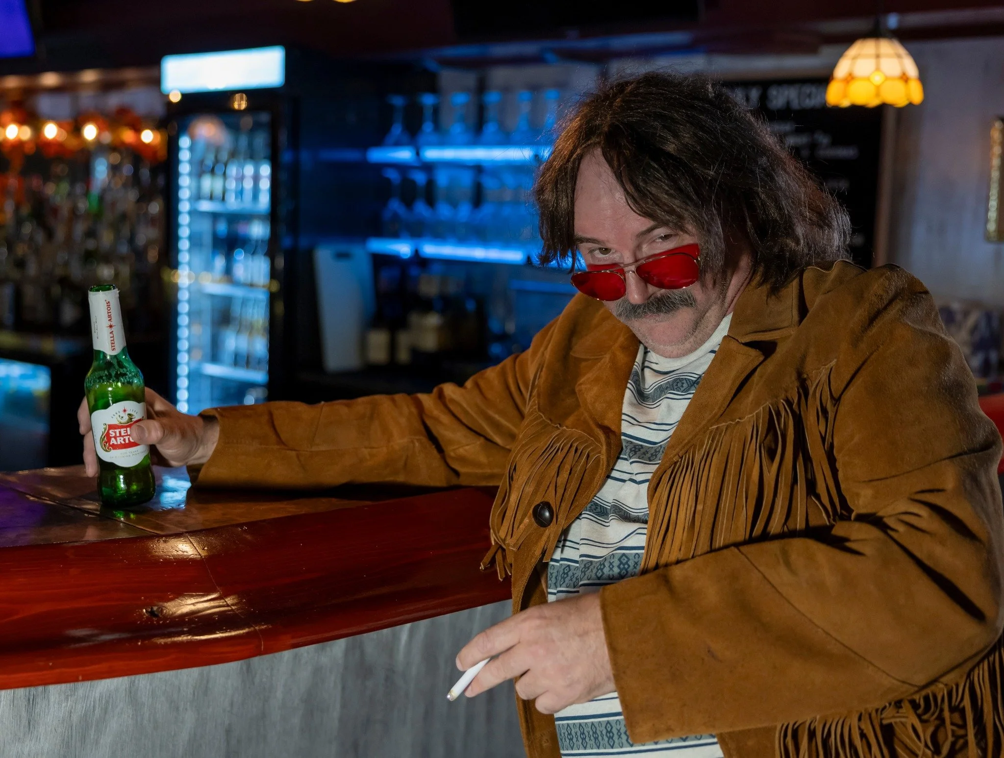 Troy Rudeseal (@rudesealt) as Dennis Dupree has officially hit that level of rock &rsquo;n&rsquo; roll chaos &mdash; posted up at the bar, beer in hand, looking like he&rsquo;s survived every tour from &rsquo;82 to now. It&rsquo;s unhinged. It&rsquo;