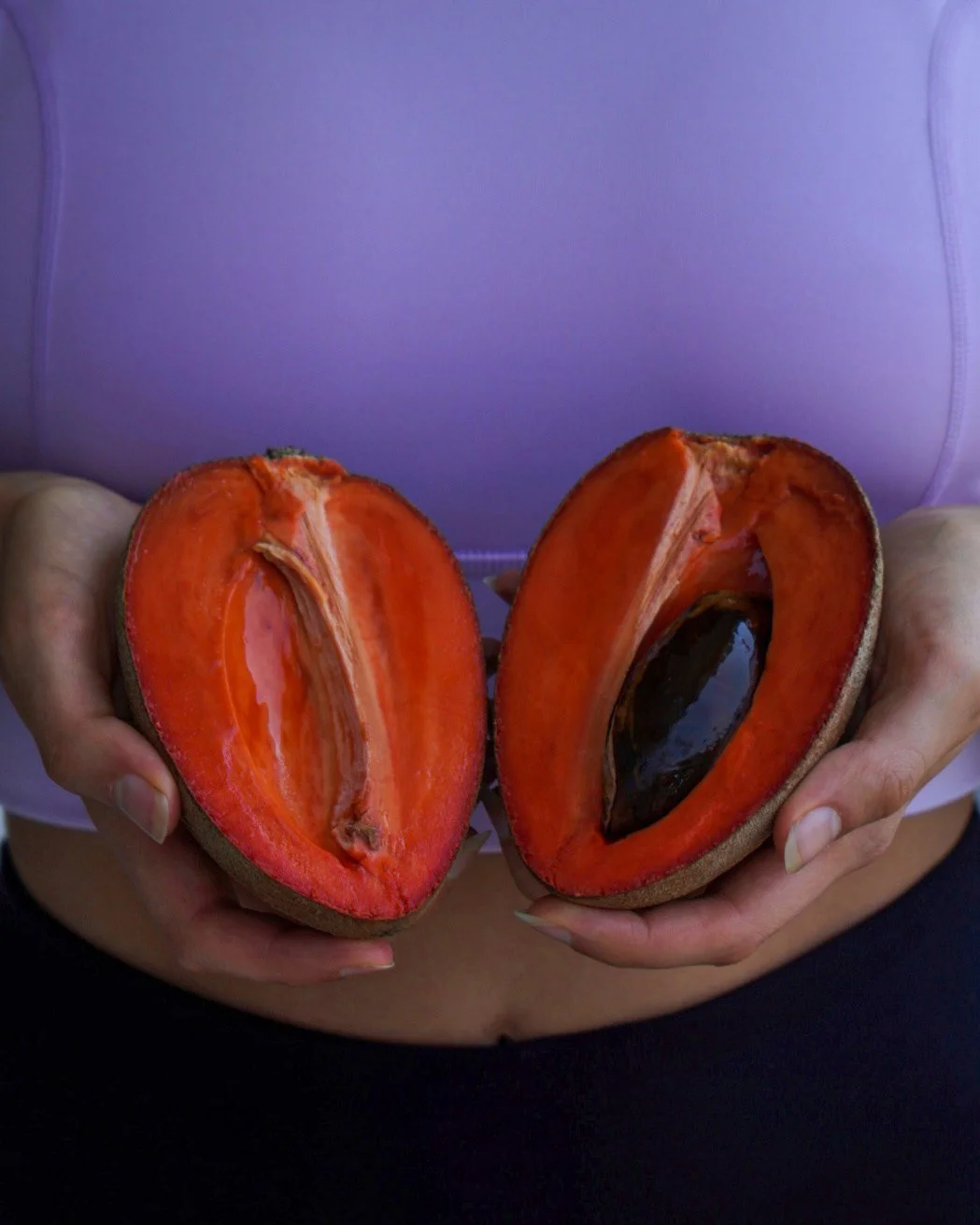 @Cocogirljen holding a Miami Fruit Mamey Sapote