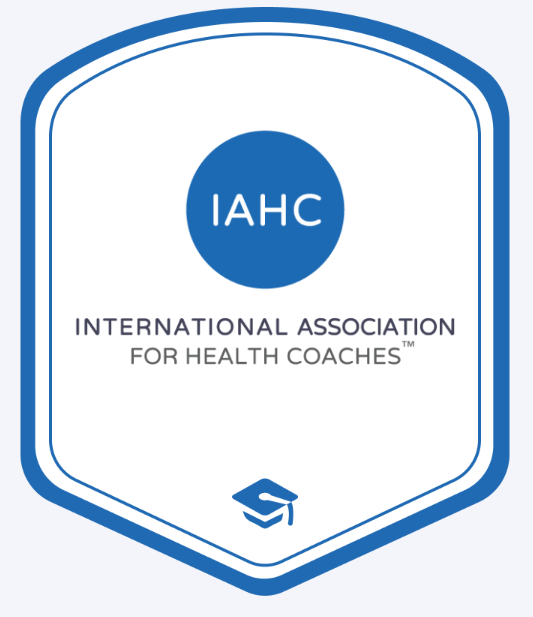 Logo of the International Association for Health Coaches featuring the acronym IAHC inside a blue circle above the organization's full name, with a graduation cap symbol at the bottom.