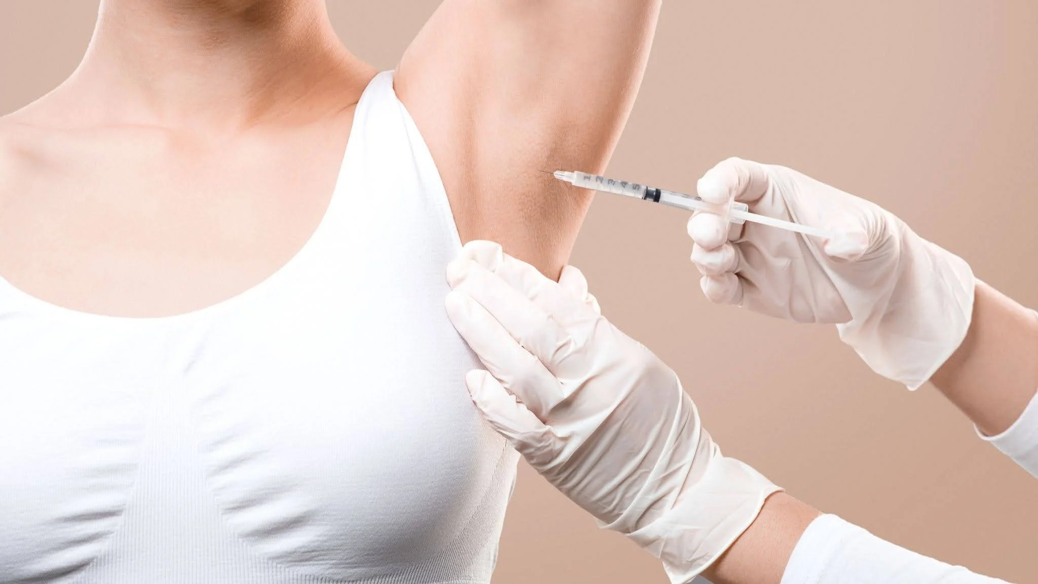 Botox treatment for excessive underarm sweating in a clinical medical spa setting in Toronto.