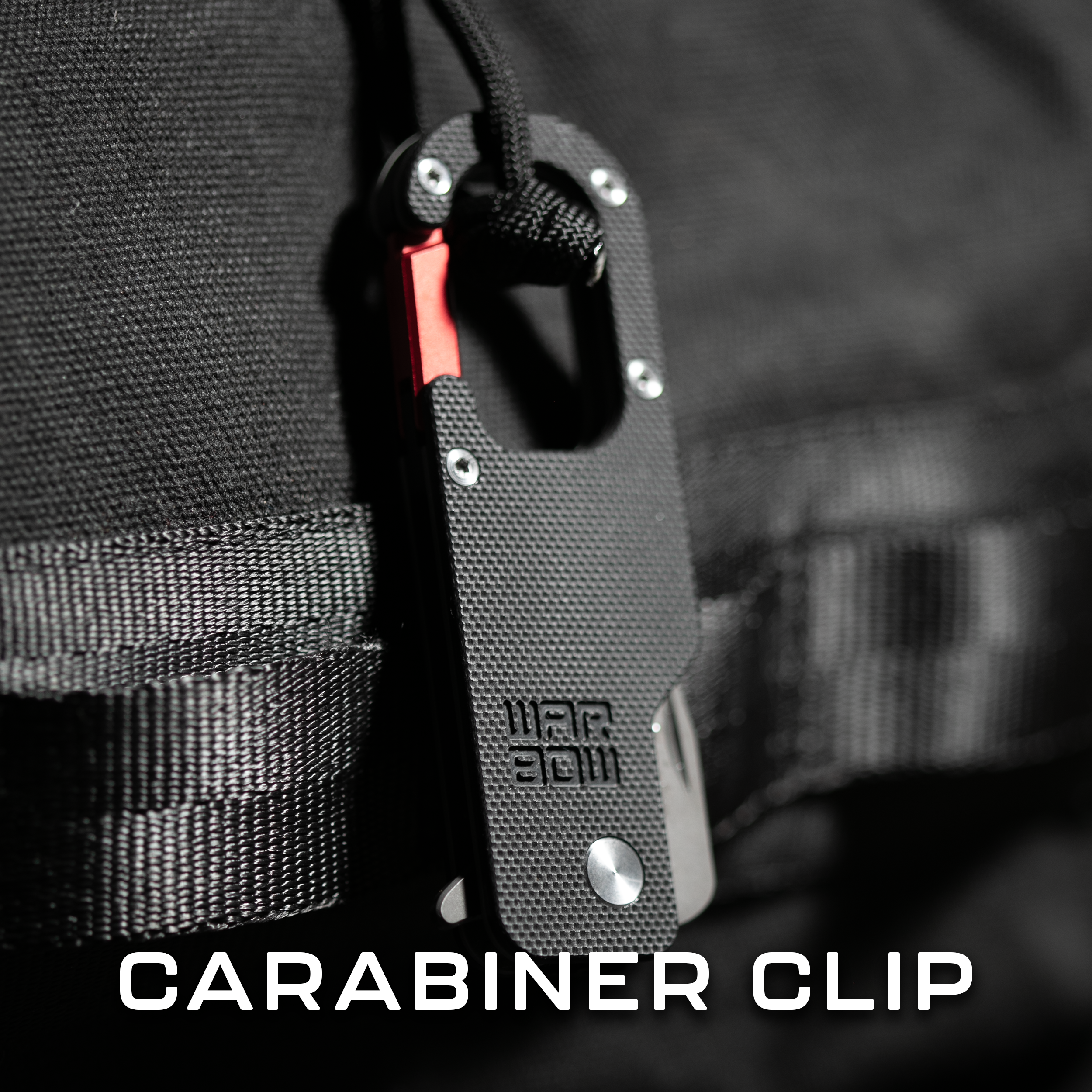 Warbow Mini Tanto Carabiner clipped to a backpack zipperpull