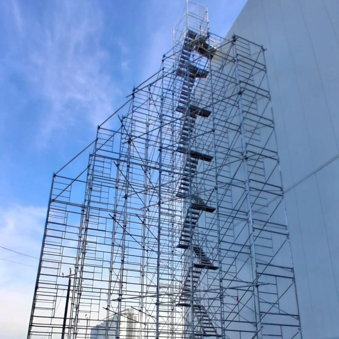 This is what real access looks like.

Full-height stair tower, tight to the building, built for nonstop movement from the ground all the way up&mdash;no ladders, no bottlenecks, no wasted time.

Simple idea. Hard to execute right.

#ScaffoldCA #Stair