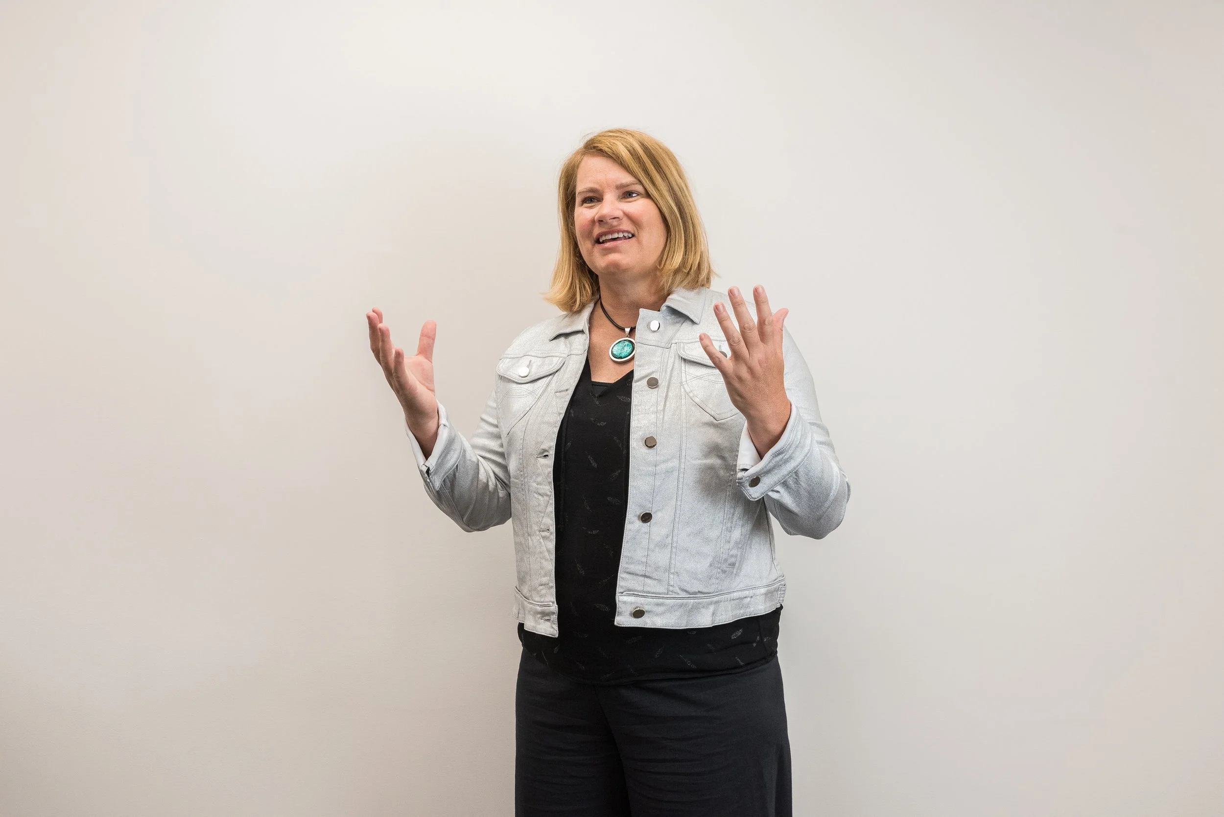 Mel Rowsell facilitating On Point Conversations training to help leaders handle high-stakes conversations without blowing up or shutting down.