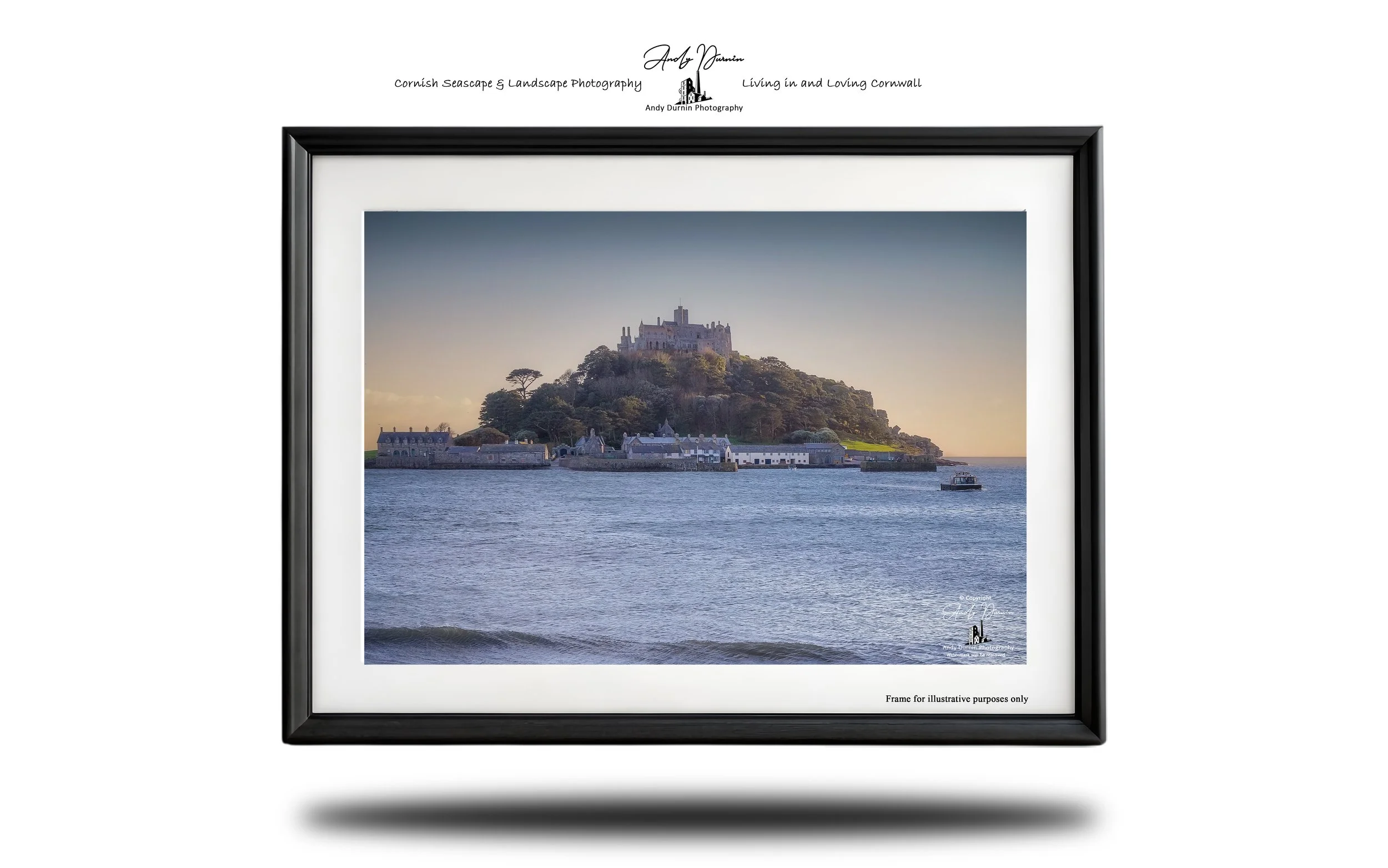 Coastal view of St Michael’s Mount with a small passenger boat