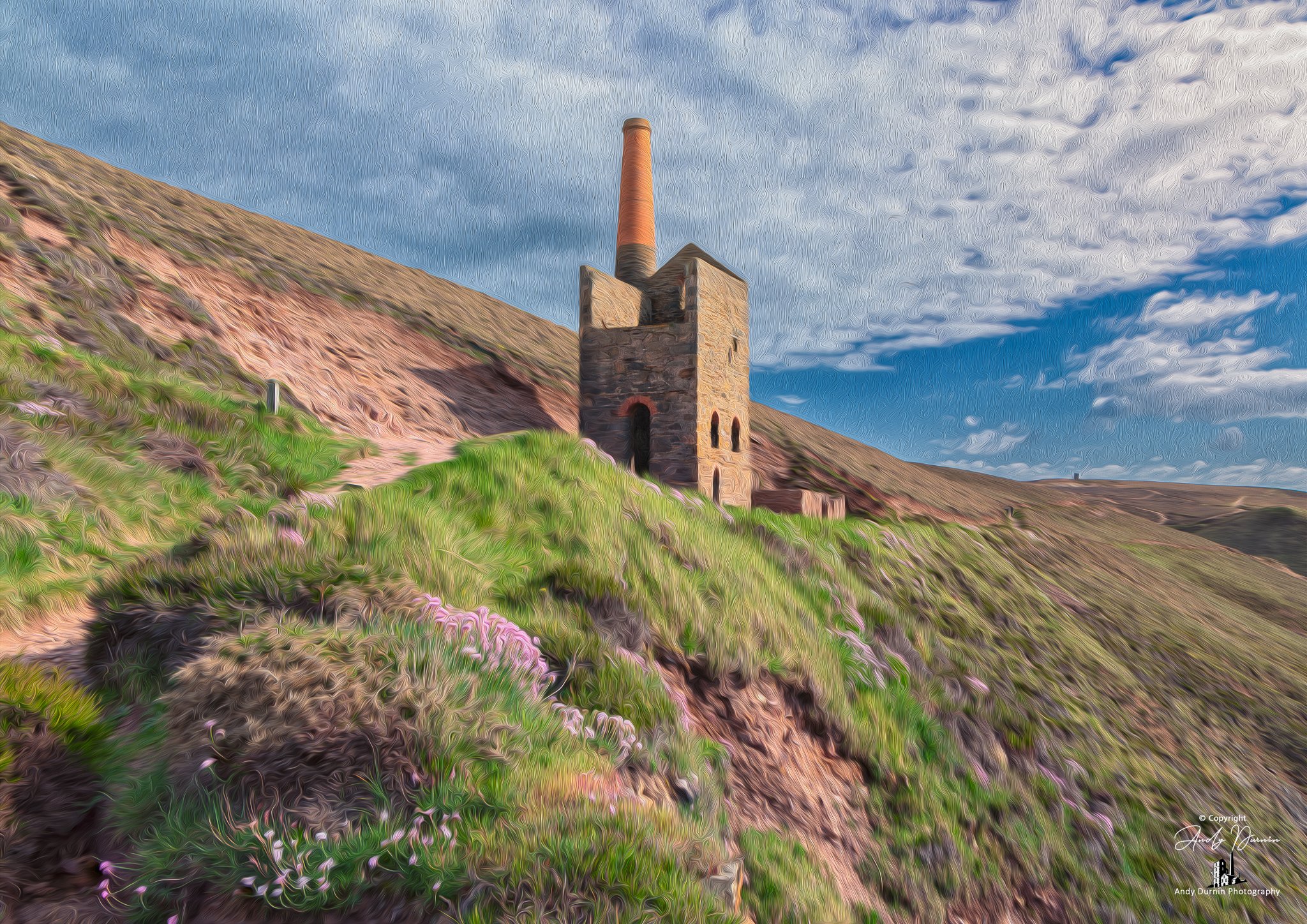 Towanroath Wheal Coates Cornwall  under a partly cloudy sky.