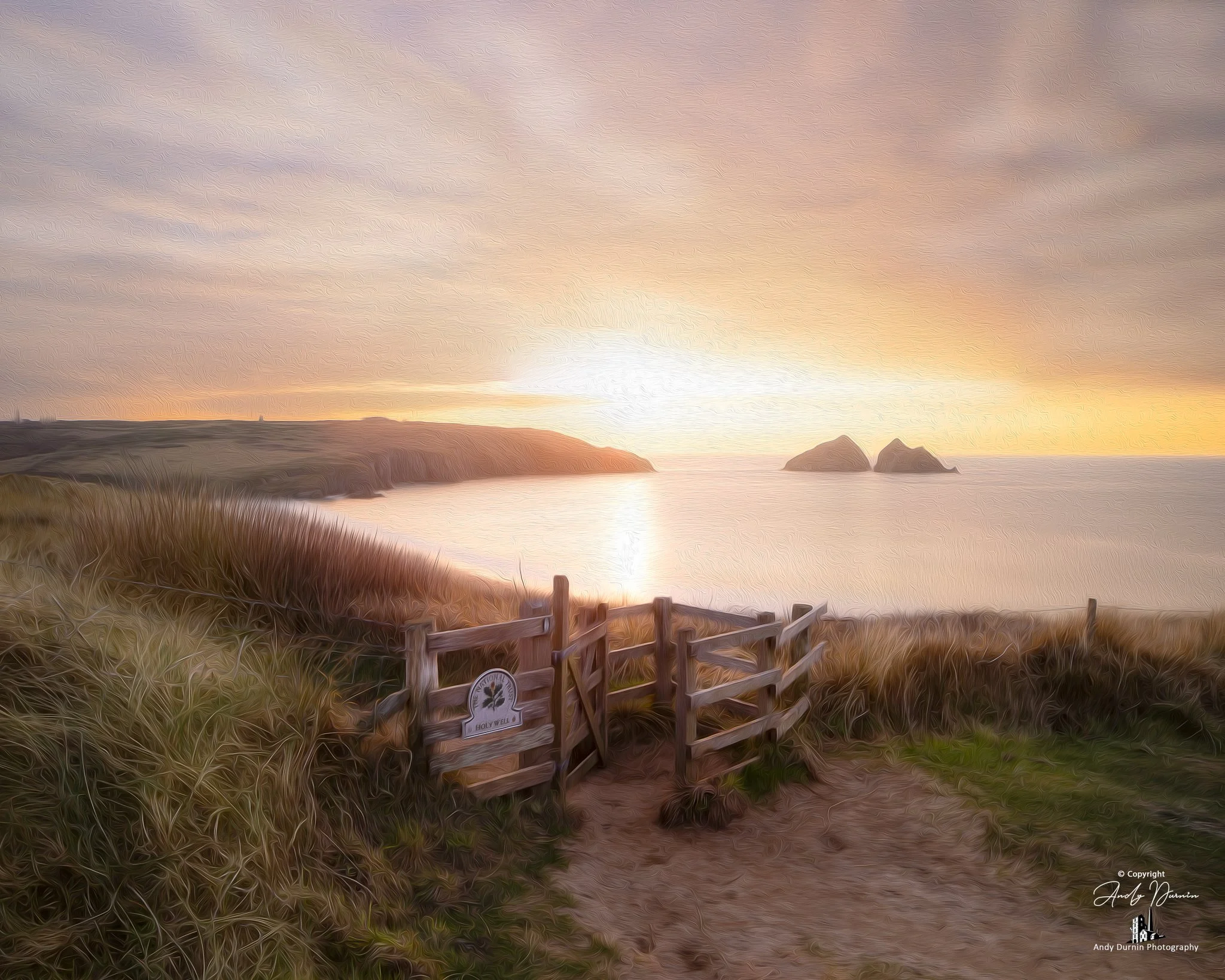 Sunset at Holywell Bay with the Gull Rocks in the distance
A soft and atmospheric photograph of Holywell Bay at sunset, with the Gull Rocks visible in the distance beyond the glowing sea. Framed by dune grasses and the coastal path, this Cornish seas