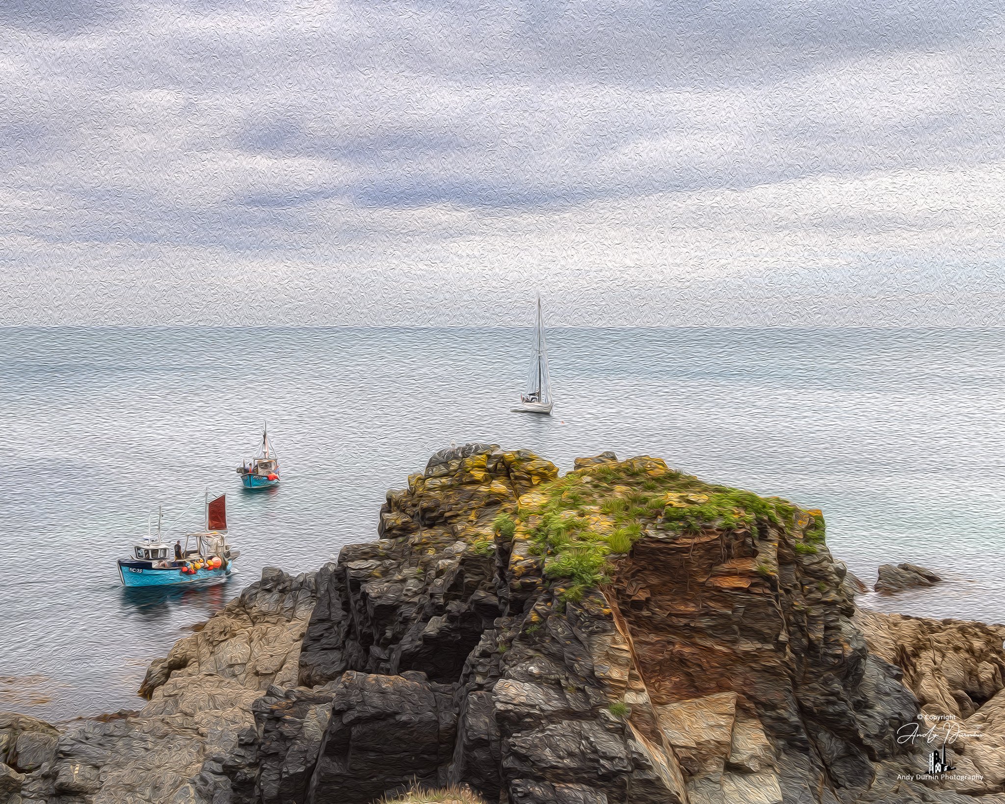 Cadgwith Cove, Cornwall Three boats sailing near rocky cliffs on a cloudy day.