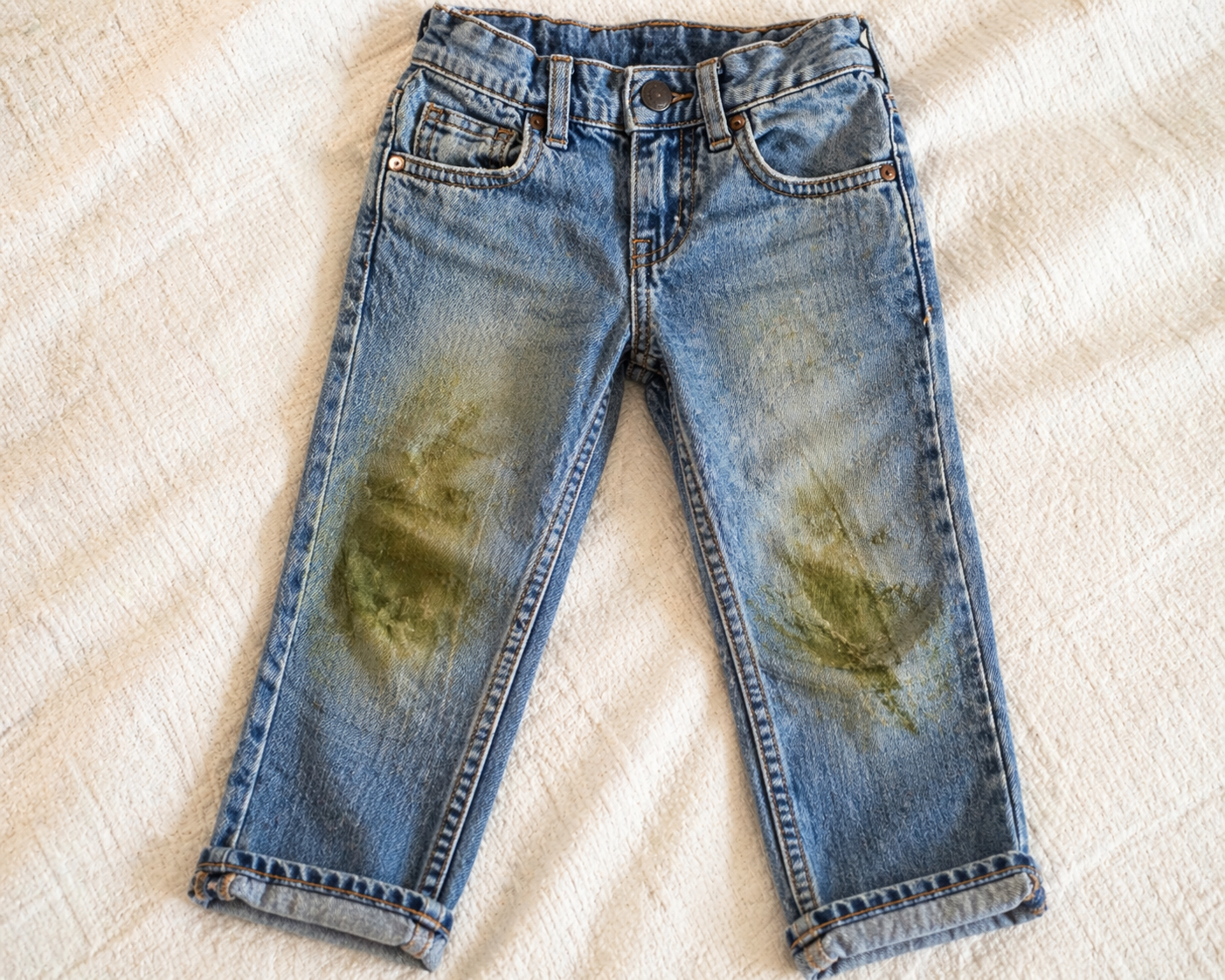 AI grass stained jeans image.png