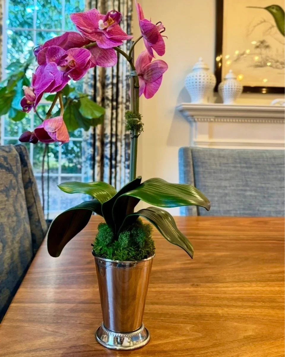 faux orchid arrangement