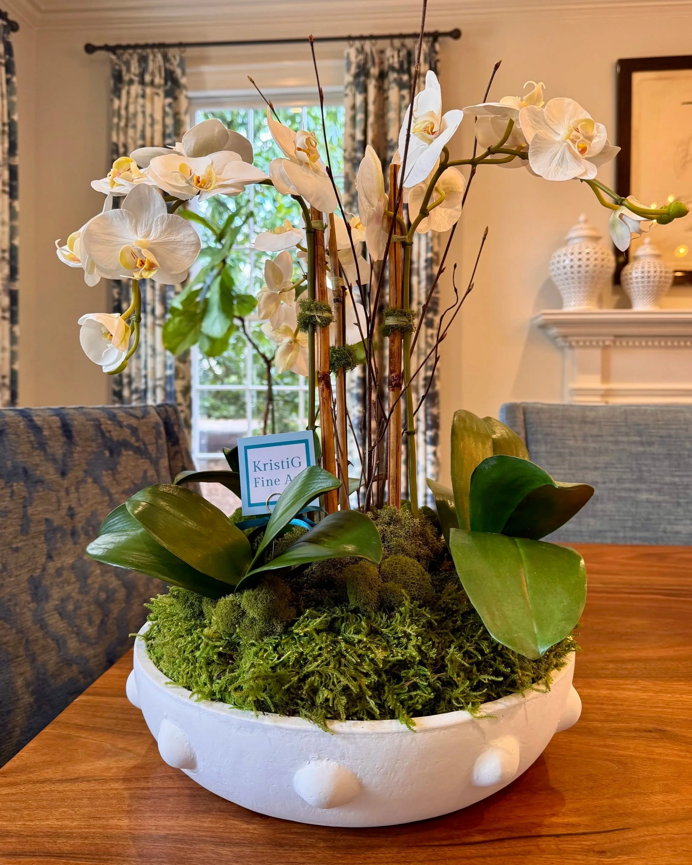 faux orchid arrangement