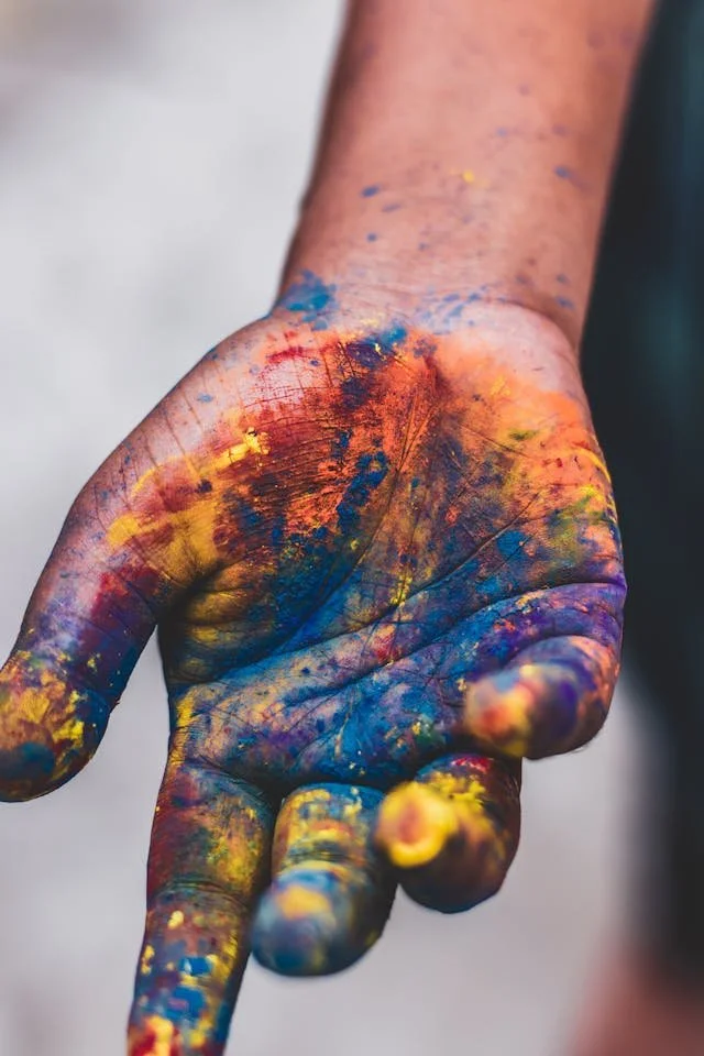 hand with paint on it