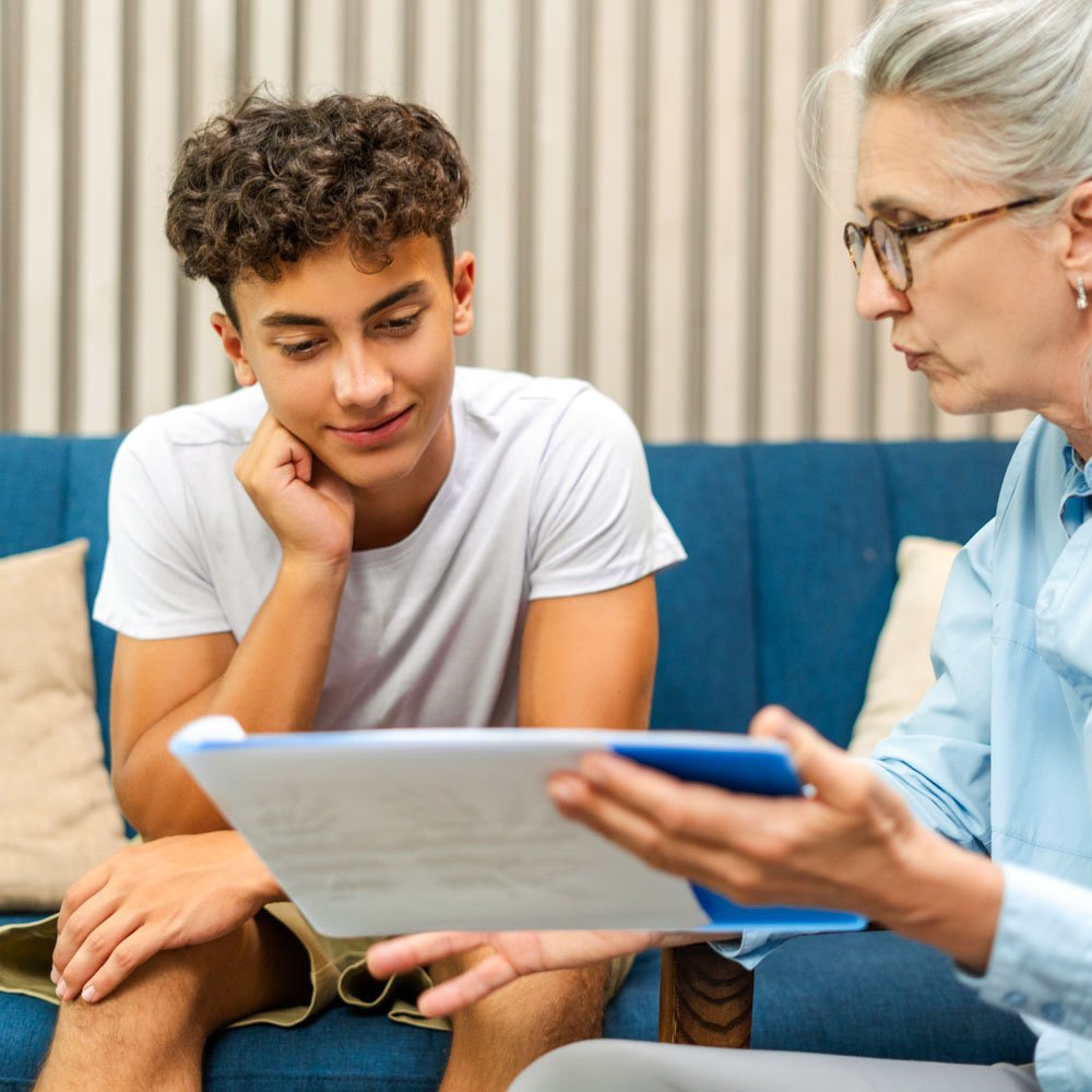 Teen in therapy session with clinician, mental health treatment in Menlo Park