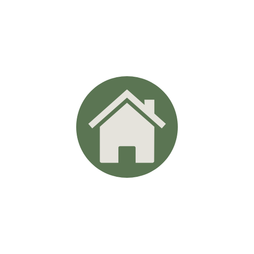 Icon of a house inside a green circle.