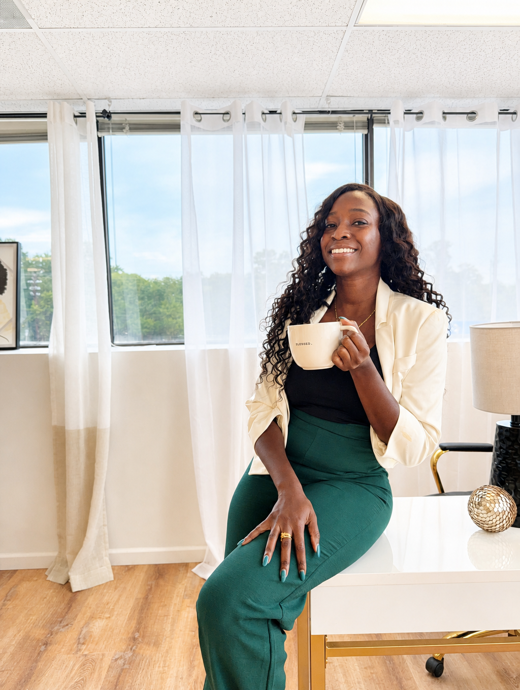 Natasha Apau, founder of Organize Mayhem, smiling ahead of a discovery call