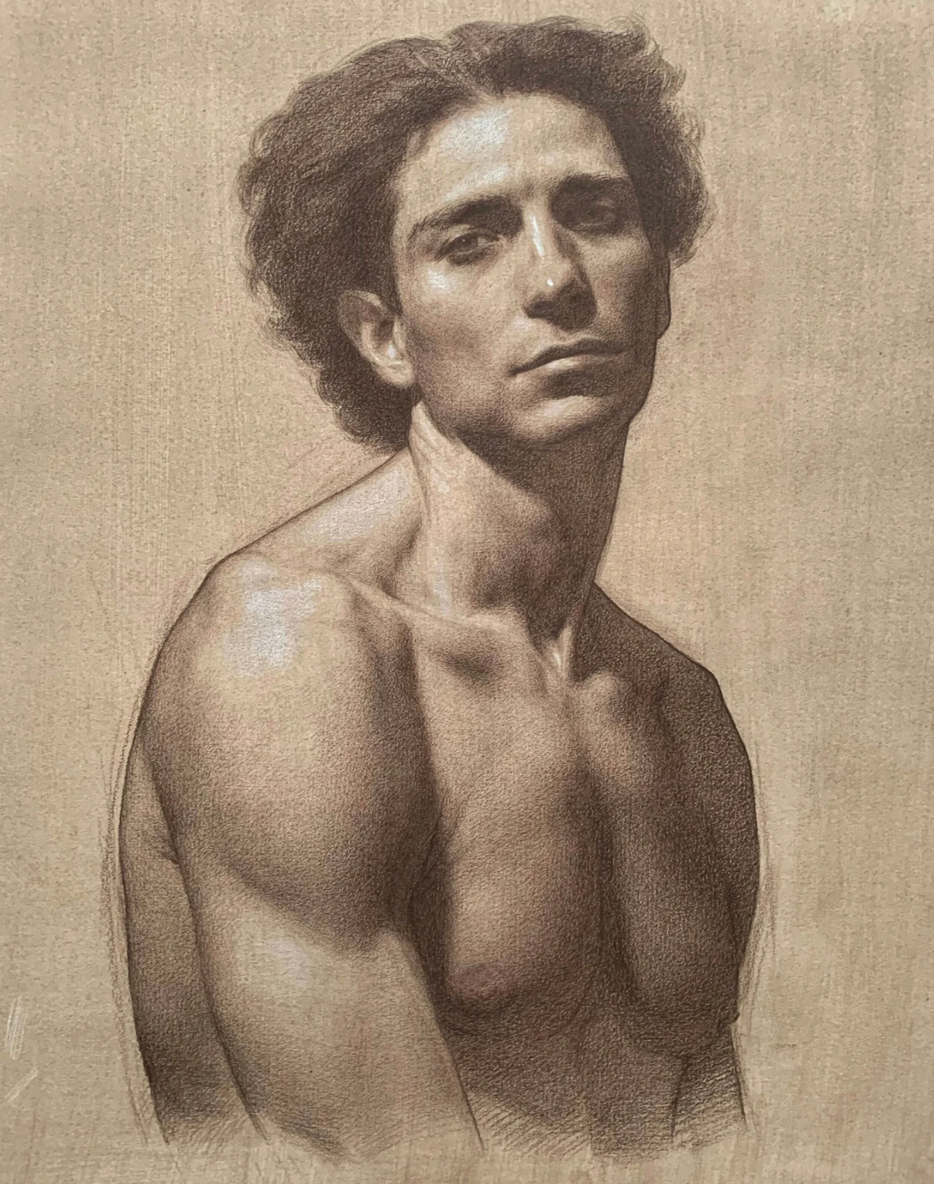 Drawn portrait of a man in a realistic style using brown and red pencil on tan-toned paper