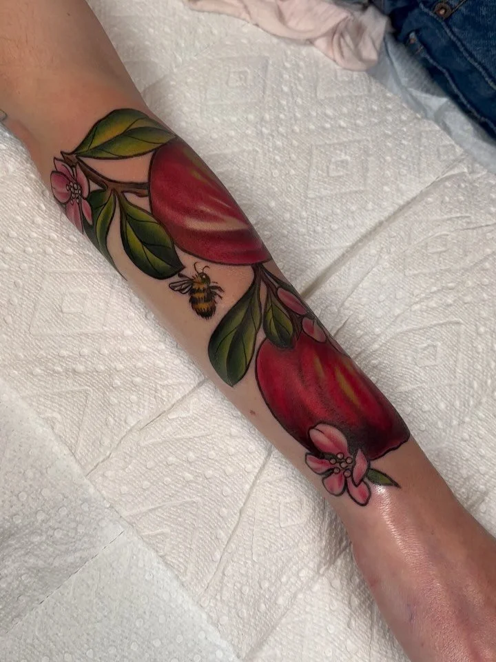 Some pre-drawn apples with a bee and blossom freehanded in, used as a cover-up for Mia.

I adore tattooing fruit! I&rsquo;m currently booking into mid September, so now is the time to inquire! 
.
.
.
#fruittattoo #oregontattoo #eugene