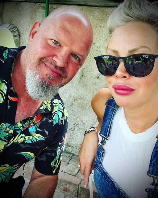 Jon and JMaxx hanging out at a pool party